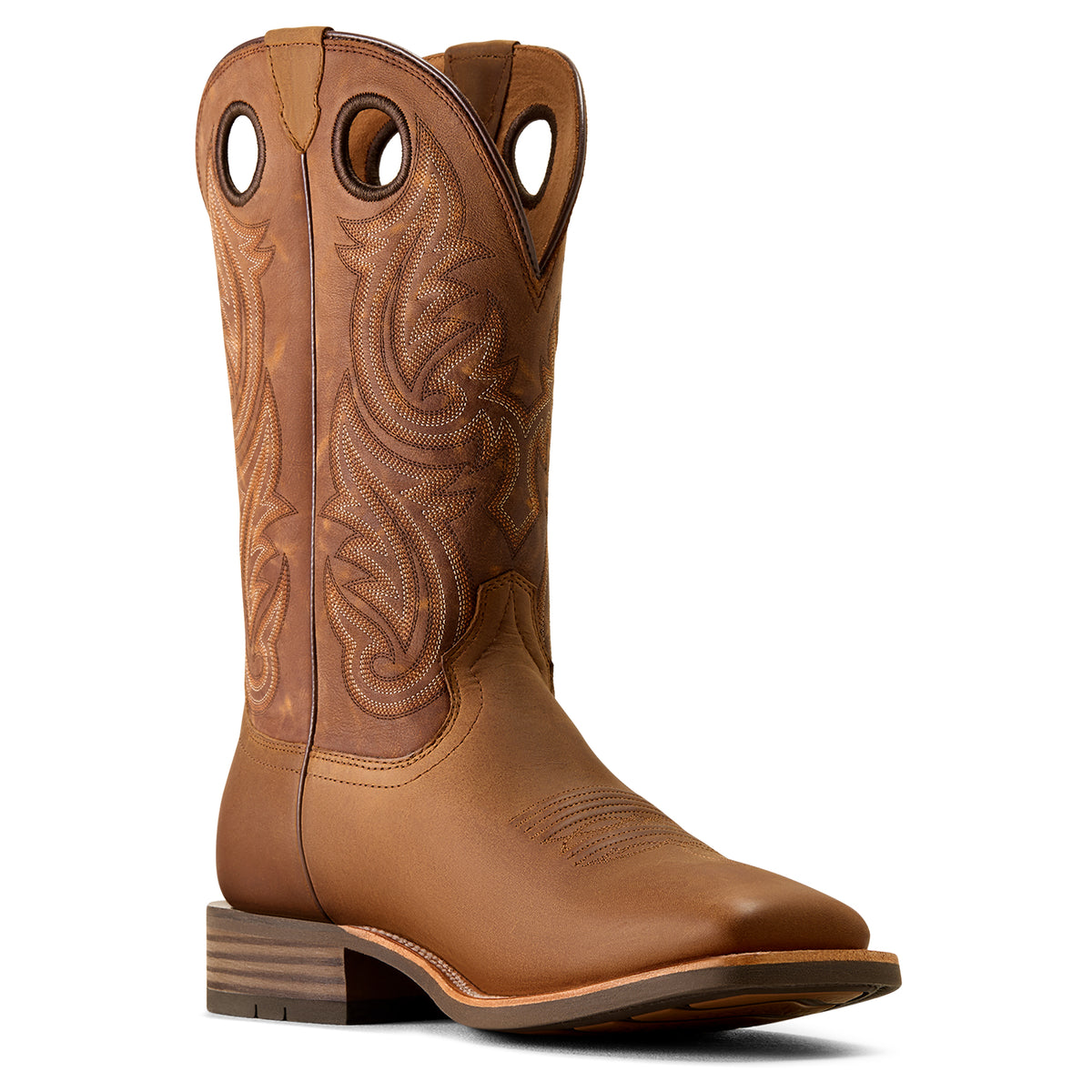 Brown cowboy boot with intricate design on a beige background