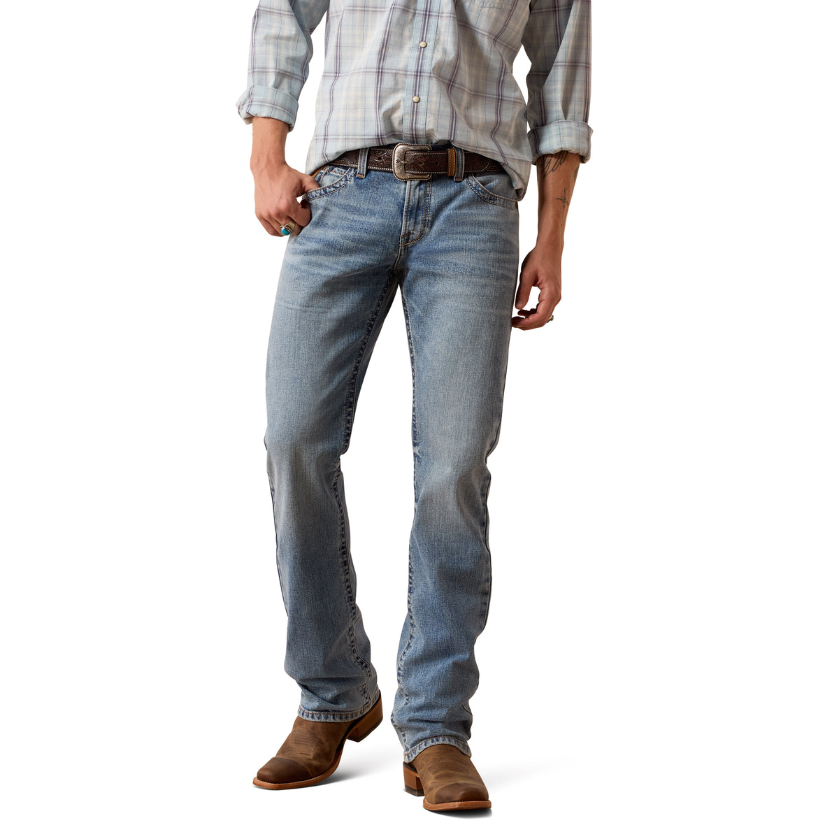 Person wearing light blue jeans and a plaid shirt on a white background