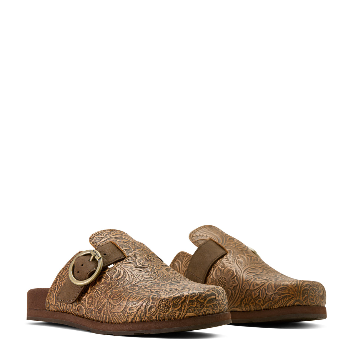 Pair of brown leather clogs with floral patterns on a white background