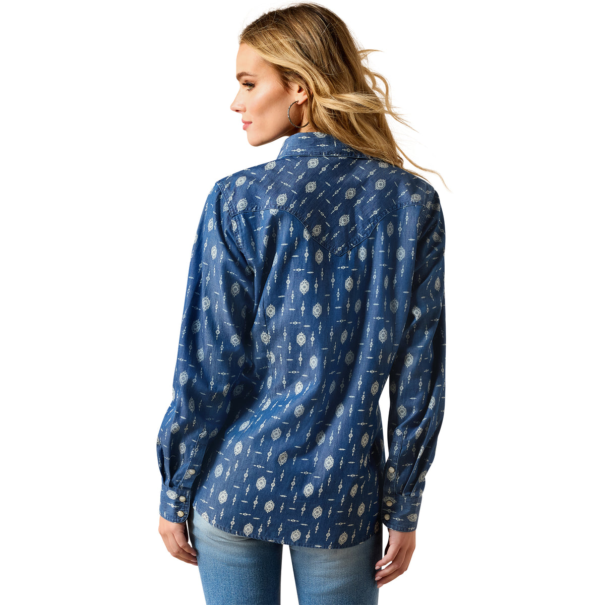Woman wearing a blue patterned shirt on a white background