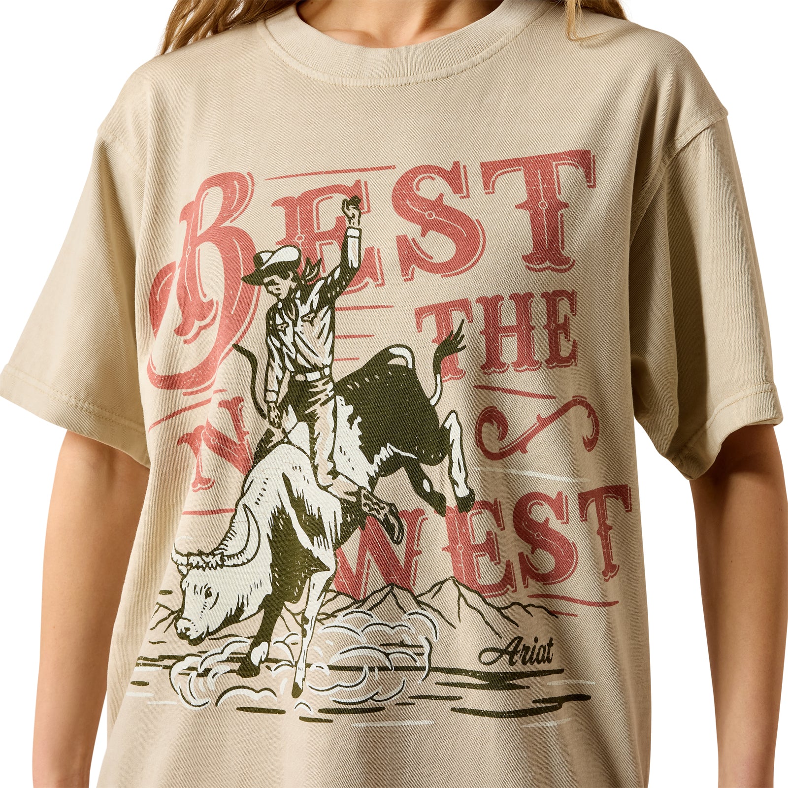 Woman wearing a graphic t-shirt with text and a graphic design on a white background