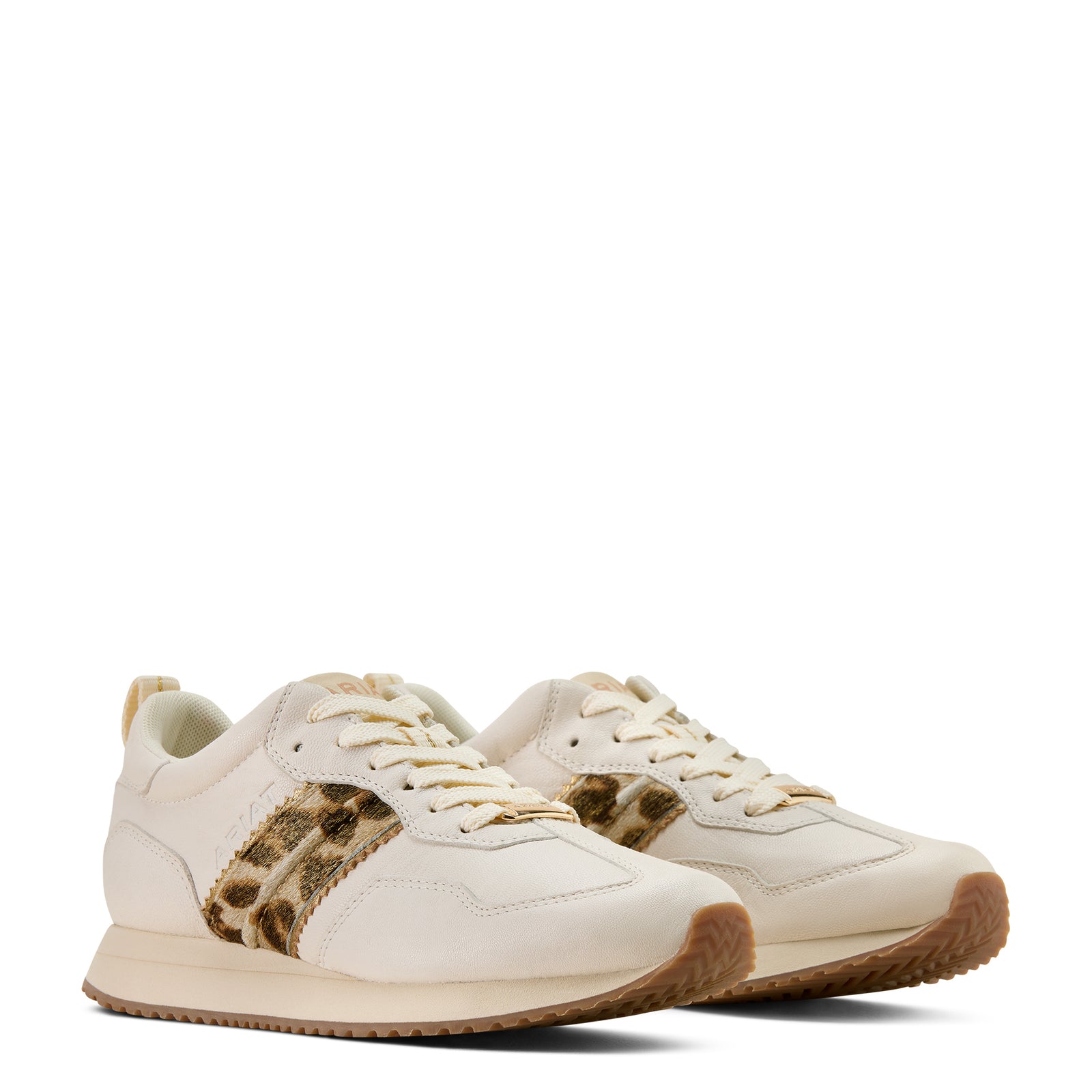 White sneakers with brown accents on a white background