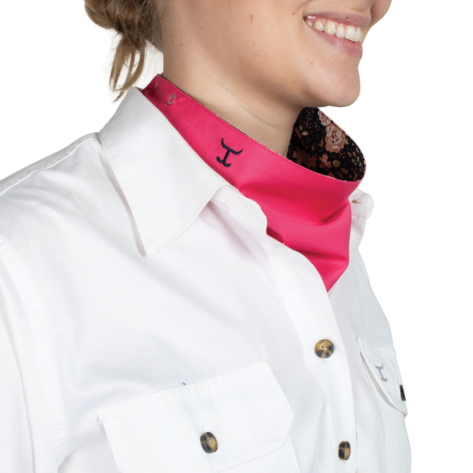 Just Country Carlee Double Sided Scarf. Person wearing a white jacket with a pink neck cover and visible brand logo.