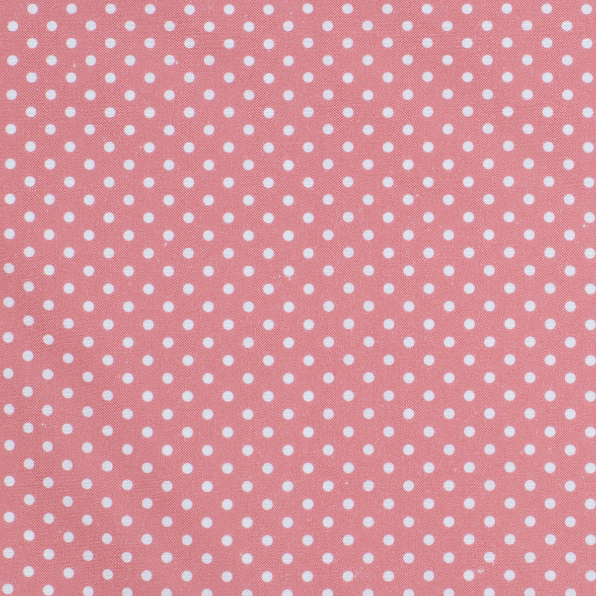 Pink fabric with white polka dots