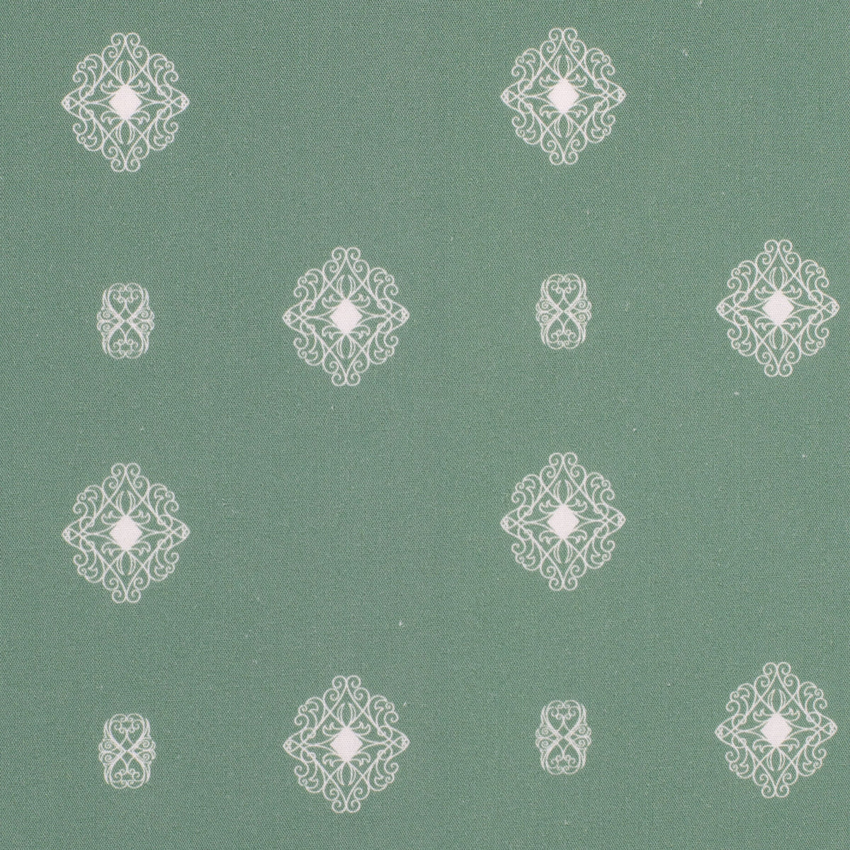 White geometric patterns on a green background