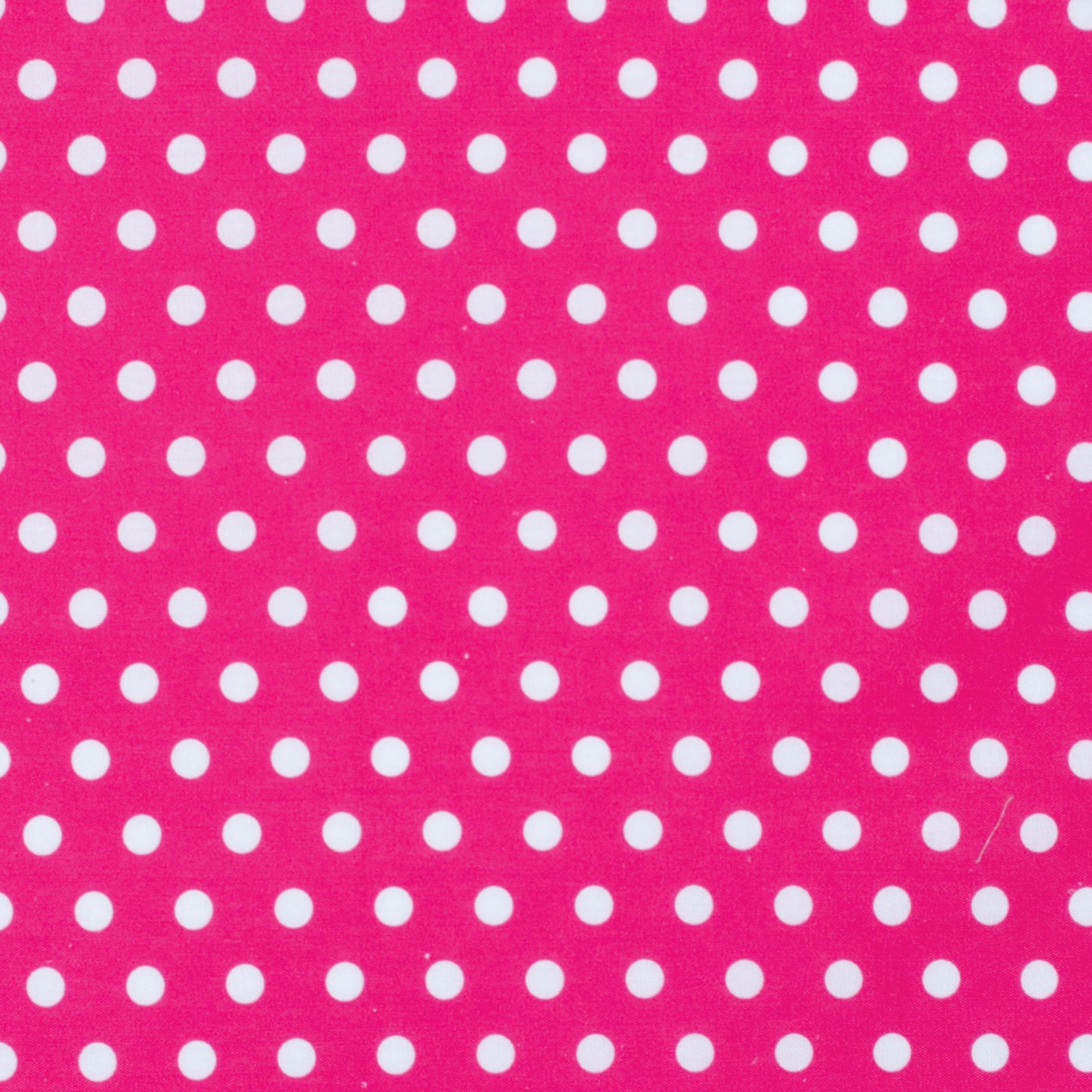 Pink background with white polka dots