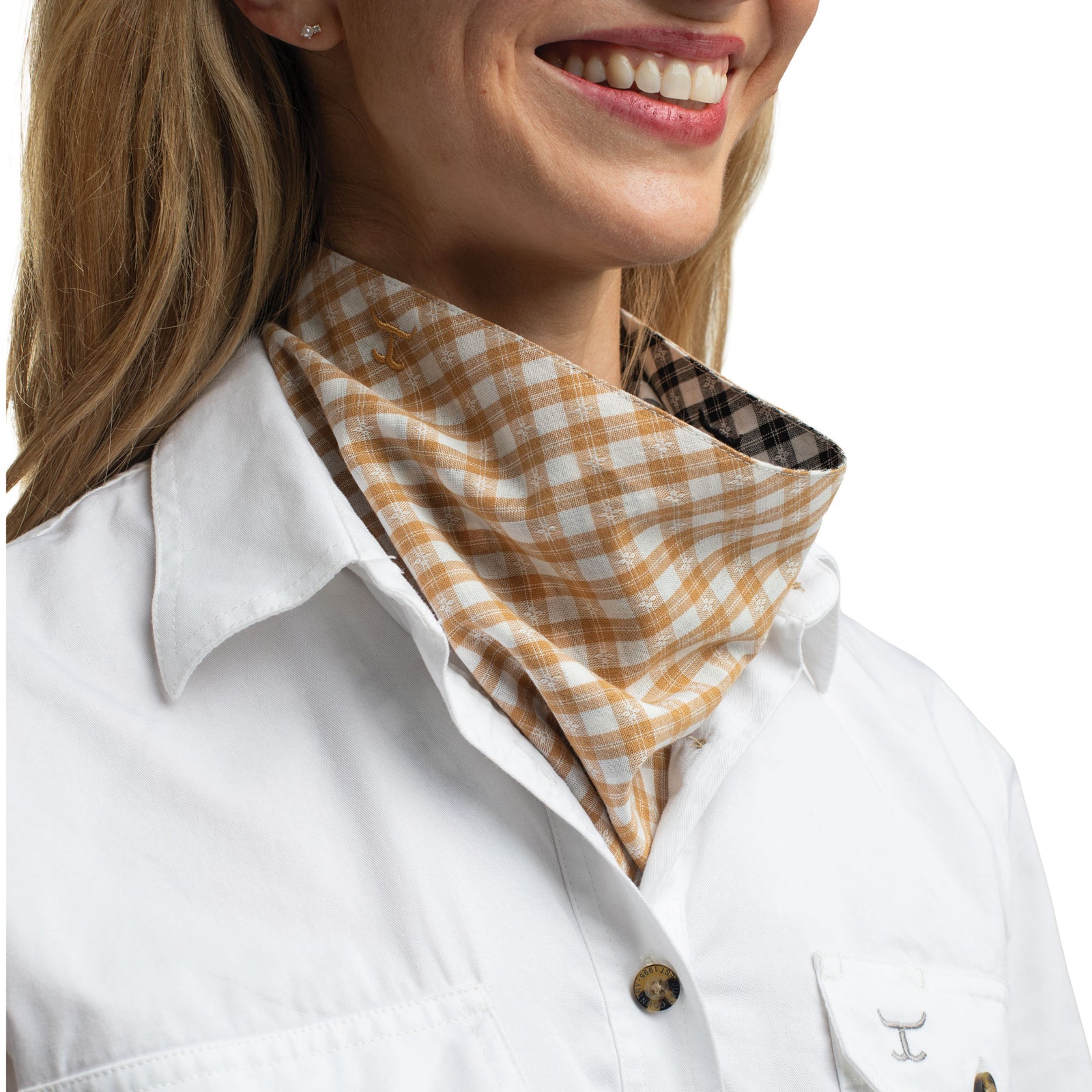 Woman wearing a plaid neck gaiter with a white shirt on a white background