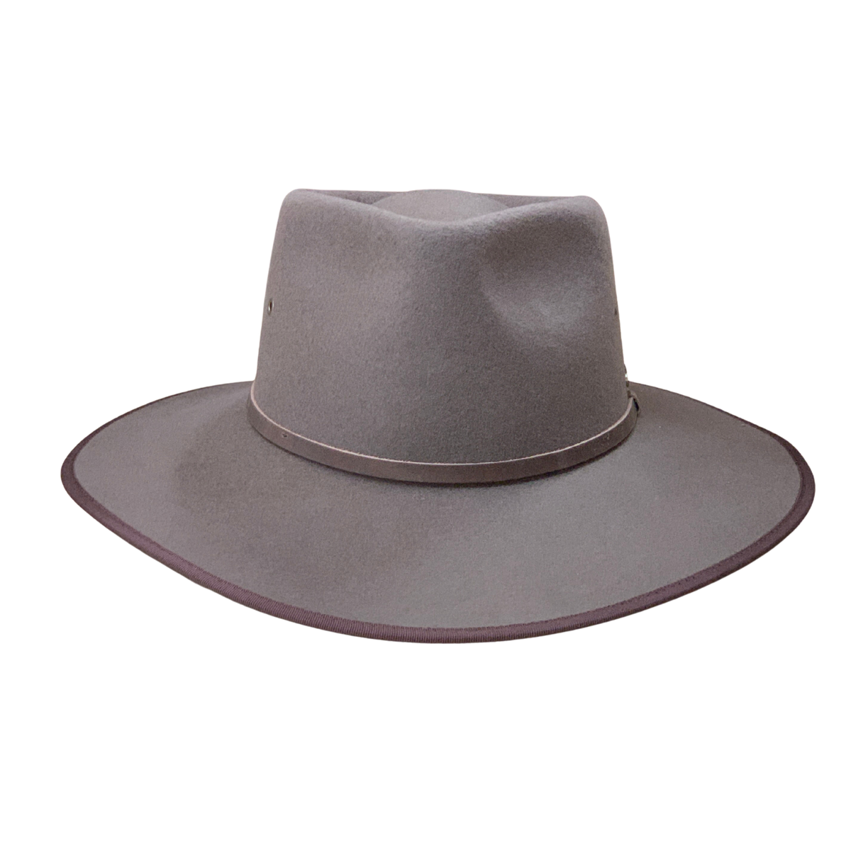 A wide-brimmed felt cowboy hat in a solid taupe gray color, featuring a matching band around the crown, shown against a plain white background.