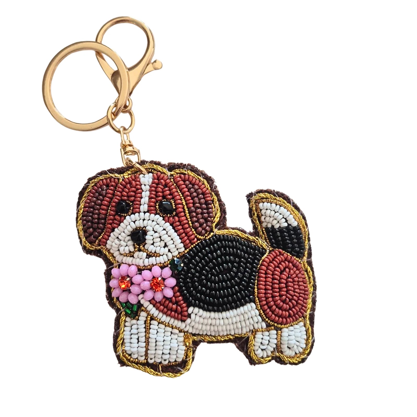 Beaded dog-shaped keychain with a pink flower on a white background