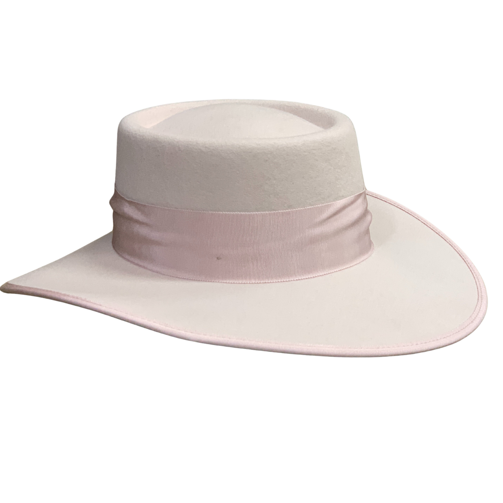 Sundaise Romy With Pink Ribbon. Wide-brimmed hat with a pink band on a white background