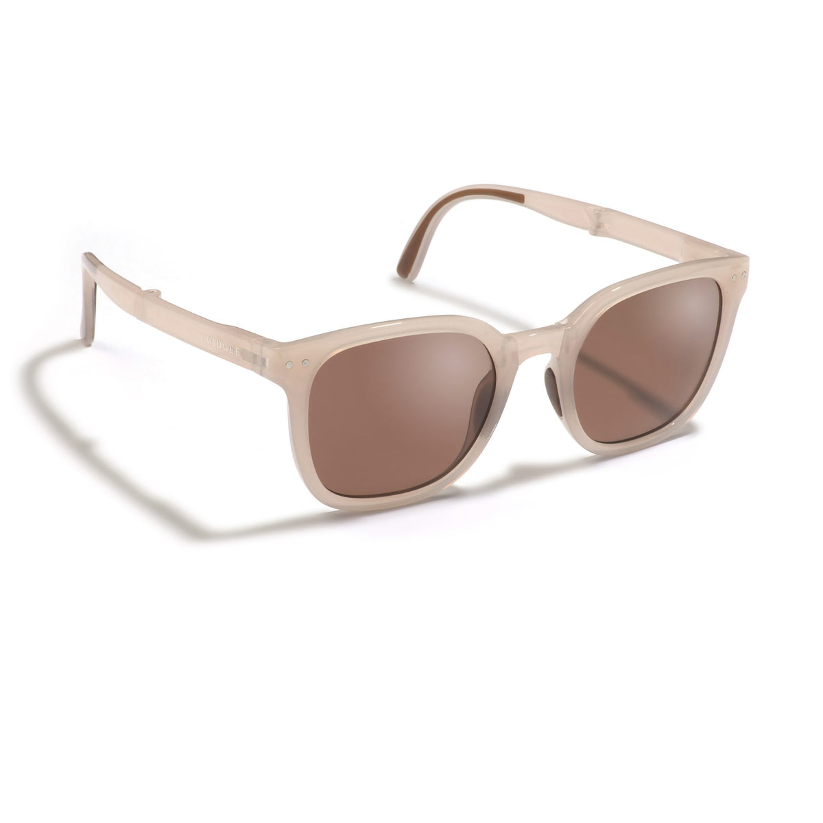 Beige sunglasses with brown lenses on a white background