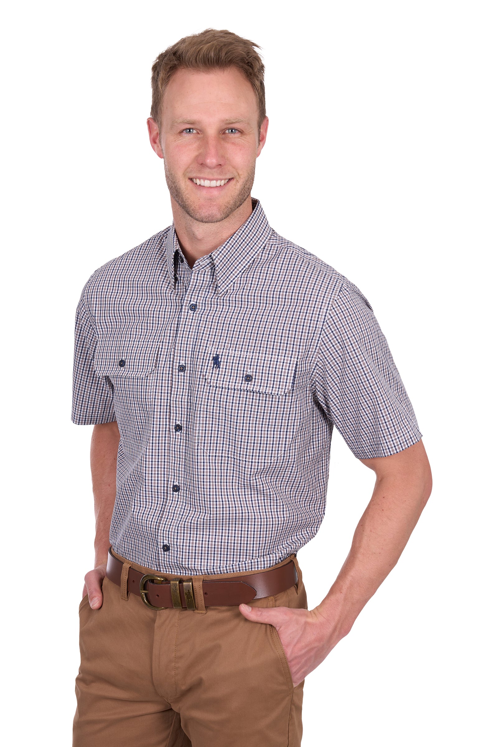Thomas Cook Men's Will S/S Shirt. Man wearing a checkered shirt and brown pants on a white background