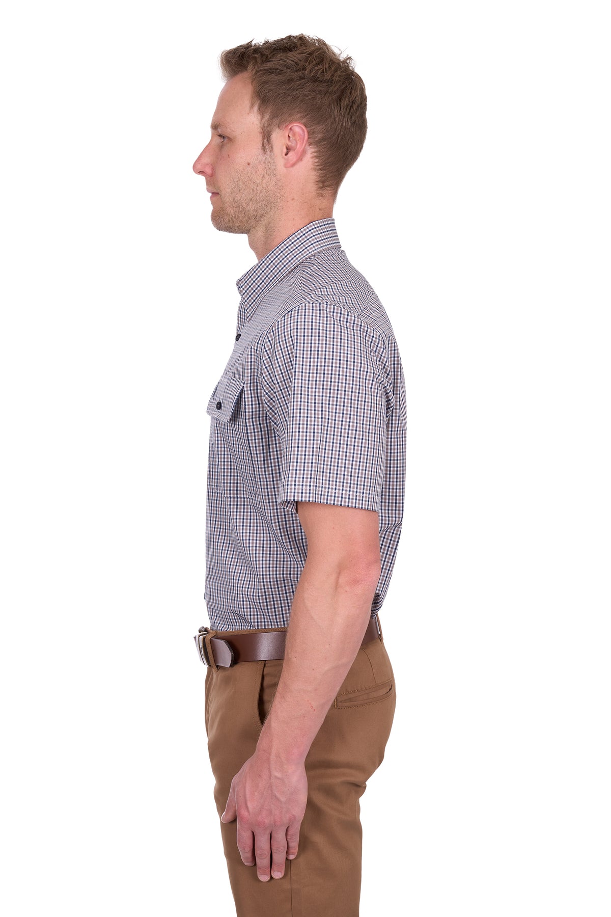 Thomas Cook Men's Will S/S Shirt. Man wearing a checkered shirt and brown pants on a white background