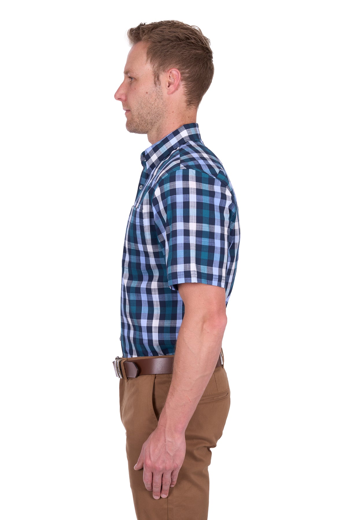 Thomas Cook Men's John S/S Shirt. Man wearing a blue and green plaid shirt with brown pants on a white background