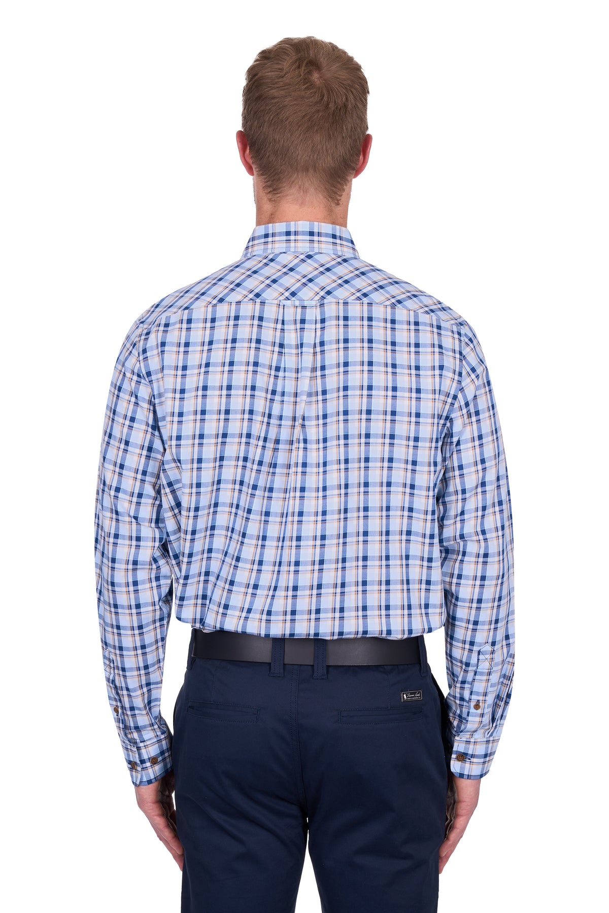 Thomas Cook Men's Thomas L/S Shirt. Man wearing a blue plaid shirt and navy pants on a white background