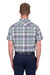 Rear view of a man wearing a Thomas Cook Men's Gerry Linen S/S Shirt. Green and navy plaid shirt and navy pants on a white background