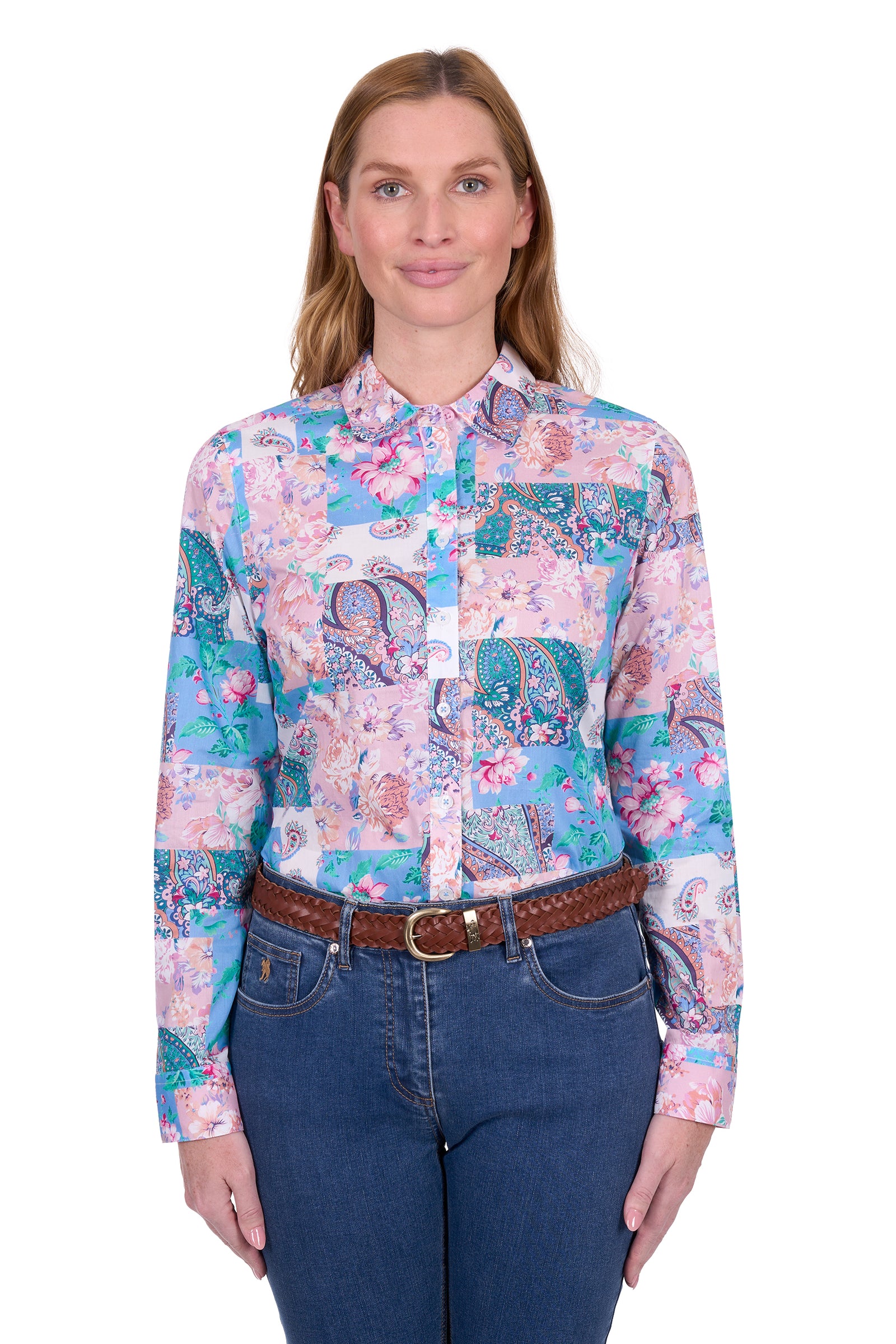 Thomas Cook Women's Annalise L/S Western Shirt. Woman wearing a colorful patchwork shirt with floral patterns on a white background