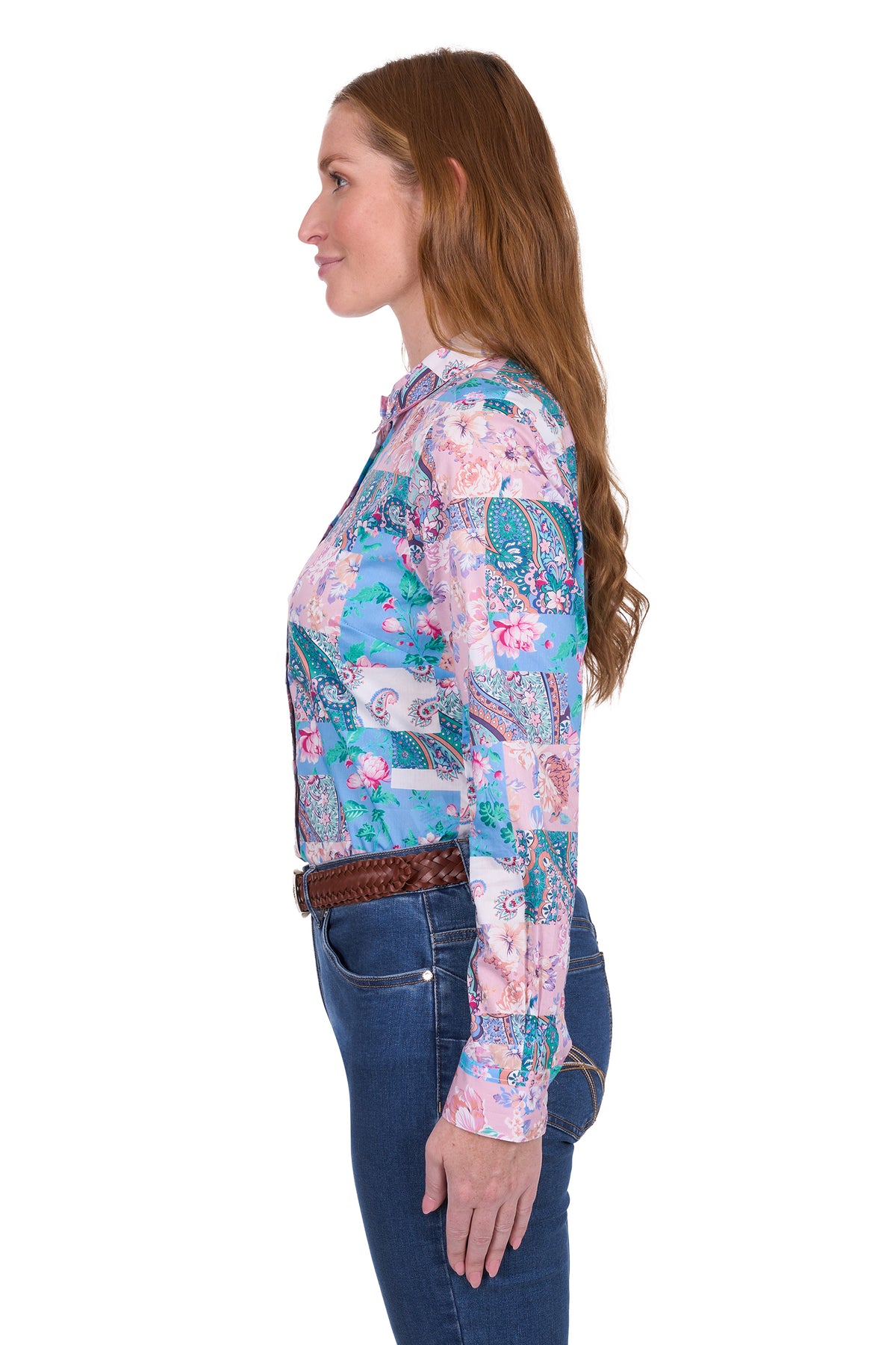 Thomas Cook Women's Annalise L/S Western Shirt. Woman wearing a colorful patterned shirt and jeans on a white background