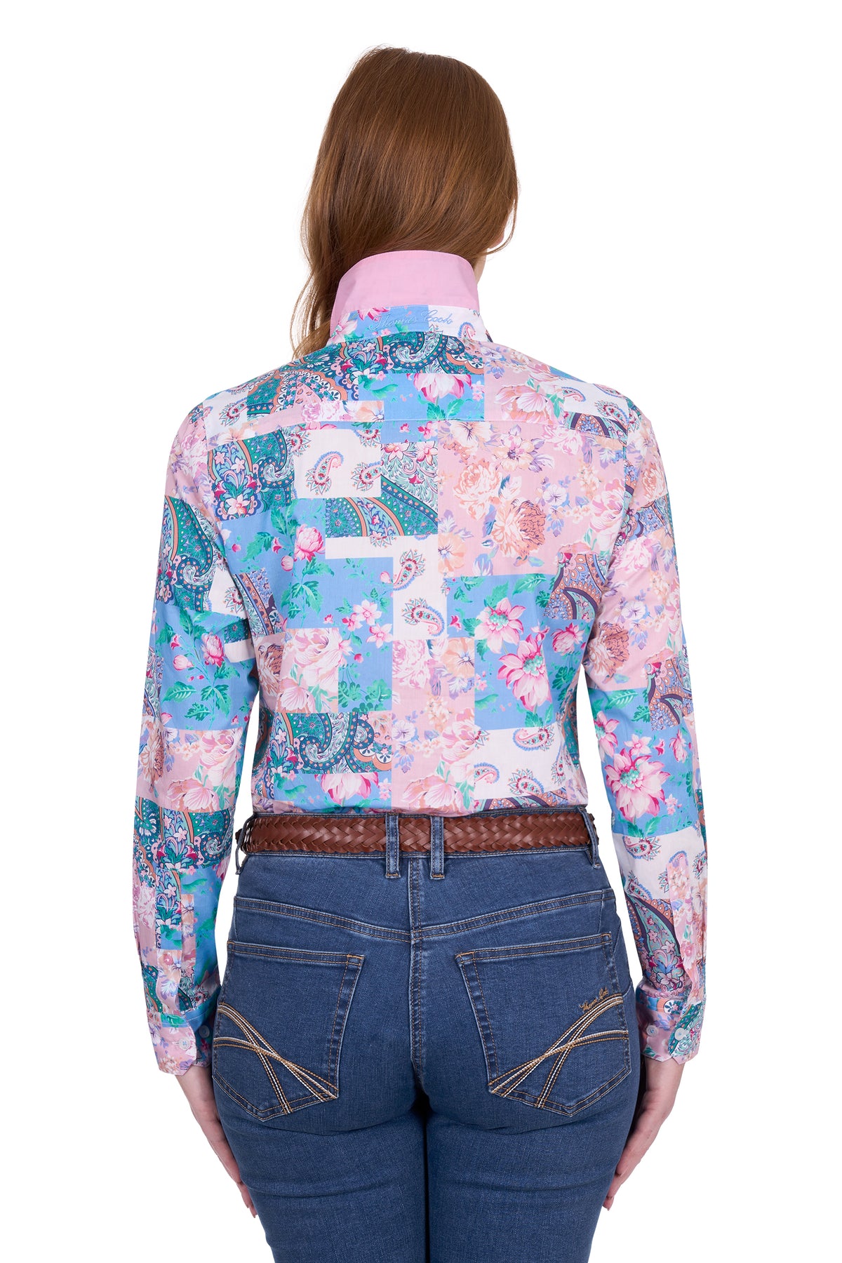 Thomas Cook Women's Annalise L/S Western Shirt. Woman wearing a colorful patchwork shirt and blue jeans on a white background