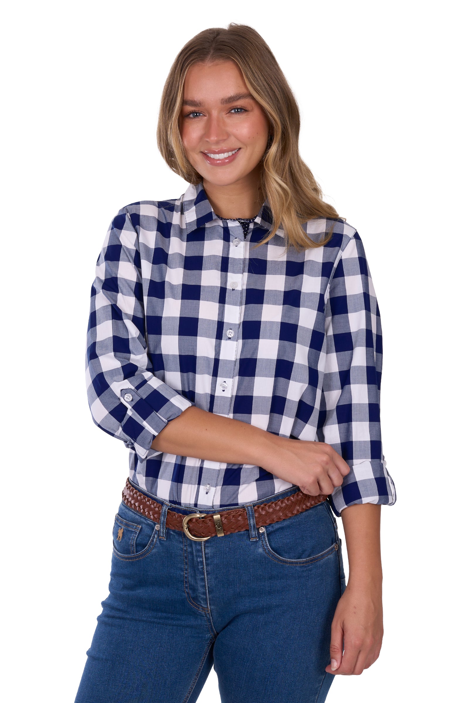 Woman wearing a Thomas Cook Women's Scarlet L/S Western Shirt. Bblue and white checkered shirt with jeans on a white background