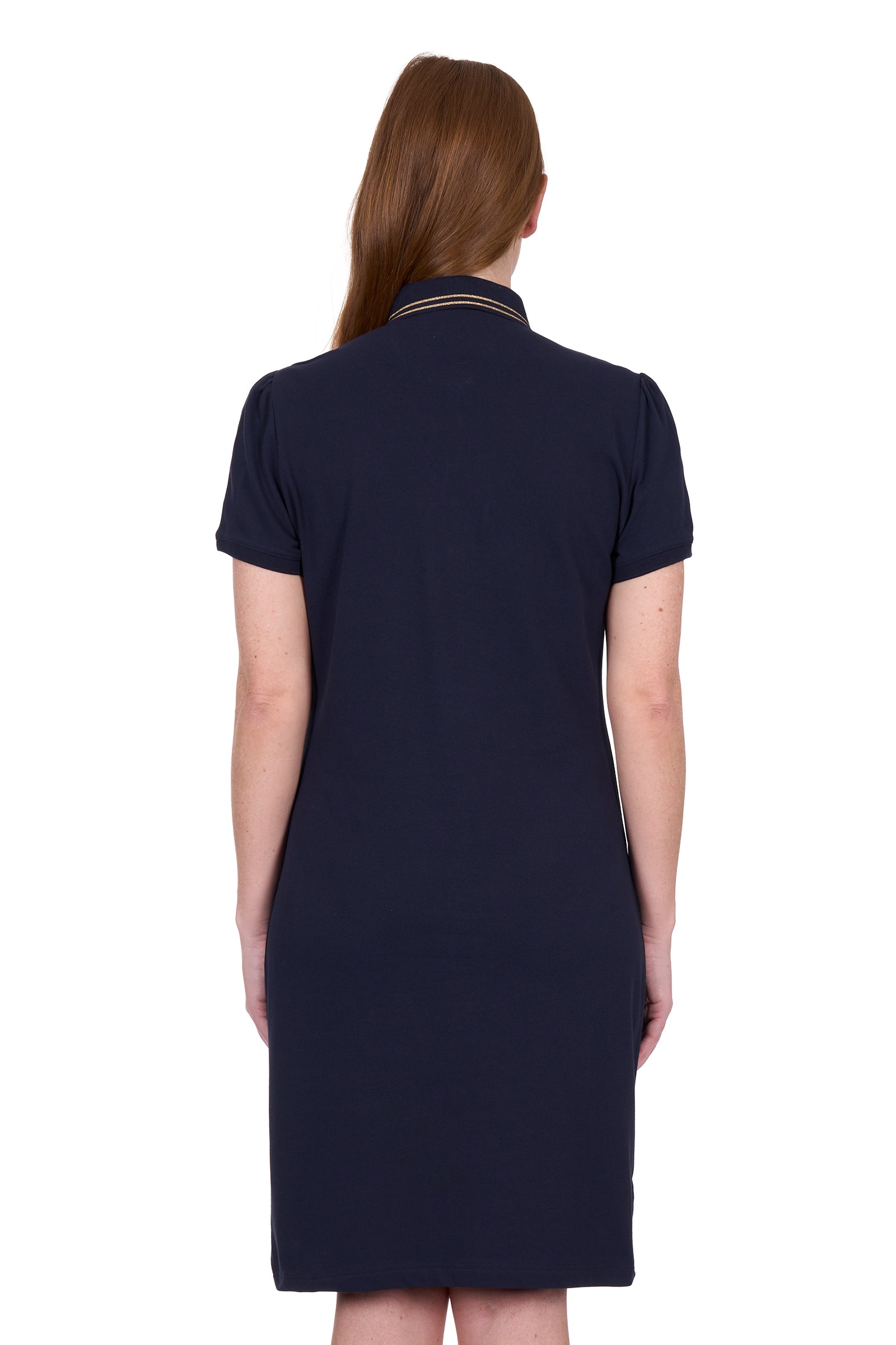 Rear view of a woman wearing a Thomas Cook Women's Traci S/S Polo Dres. Navy blue polo dress with a small logo on a white background