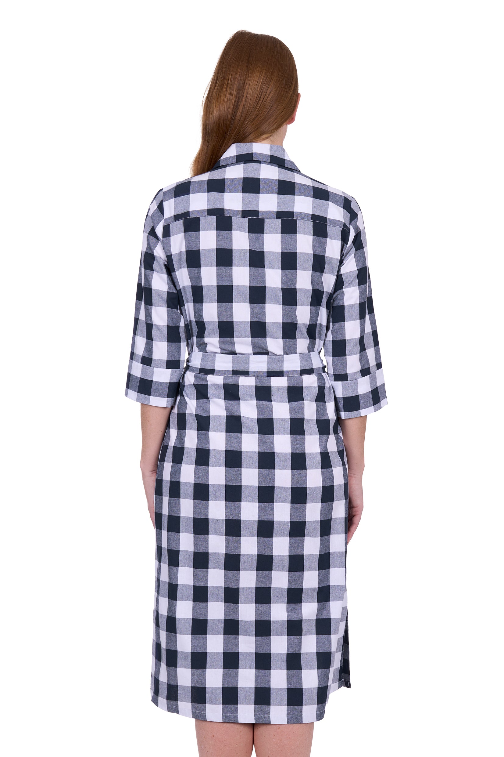 Thomas Cook Women's Bella Shirt Dress. Woman wearing a black and white checkered dress on a white background