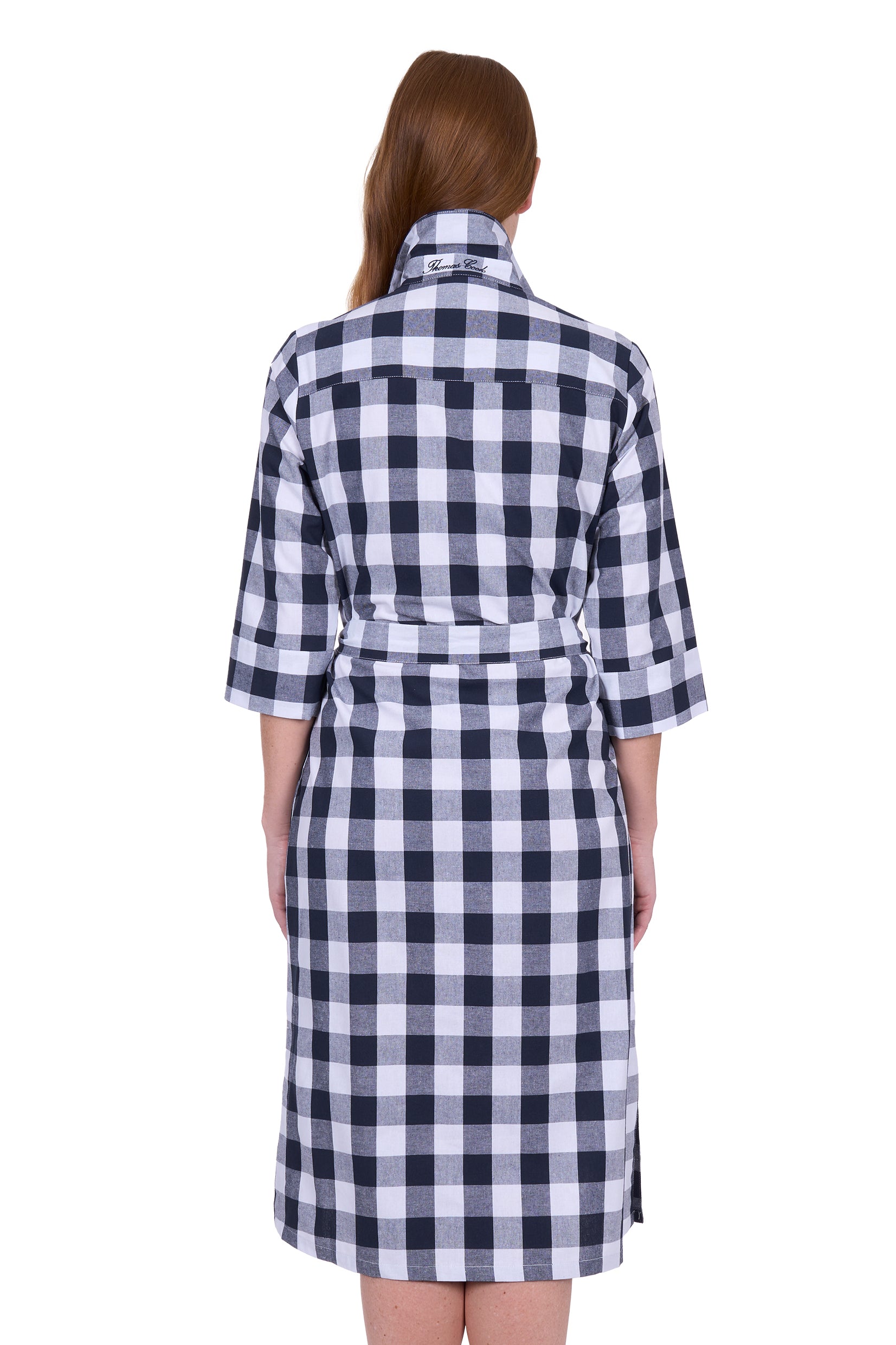 Thomas Cook Women's Bella Shirt Dress. Woman wearing a black and white checkered dress on a white background