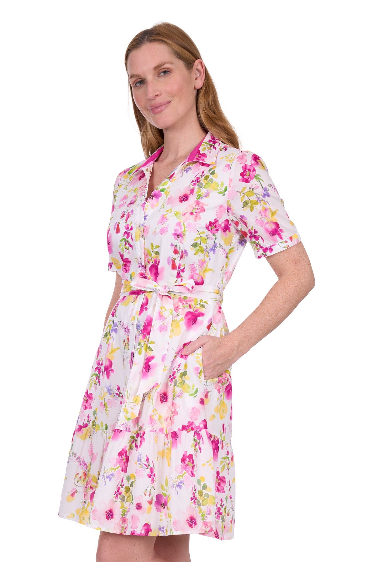 Thomas Cook Women&#39;s Flora S/S Dress. Woman wearing a floral dress on a white background