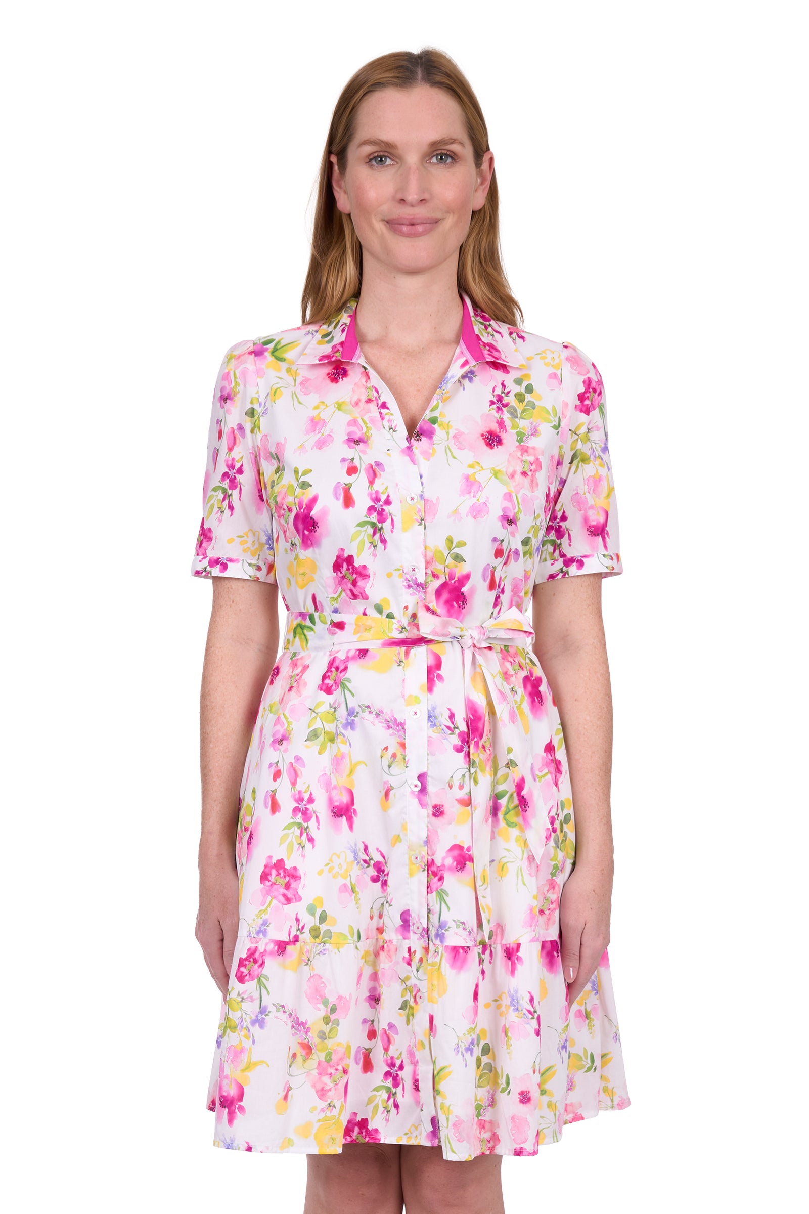 Thomas Cook Women's Flora S/S Dress. Woman wearing a floral dress on a white background