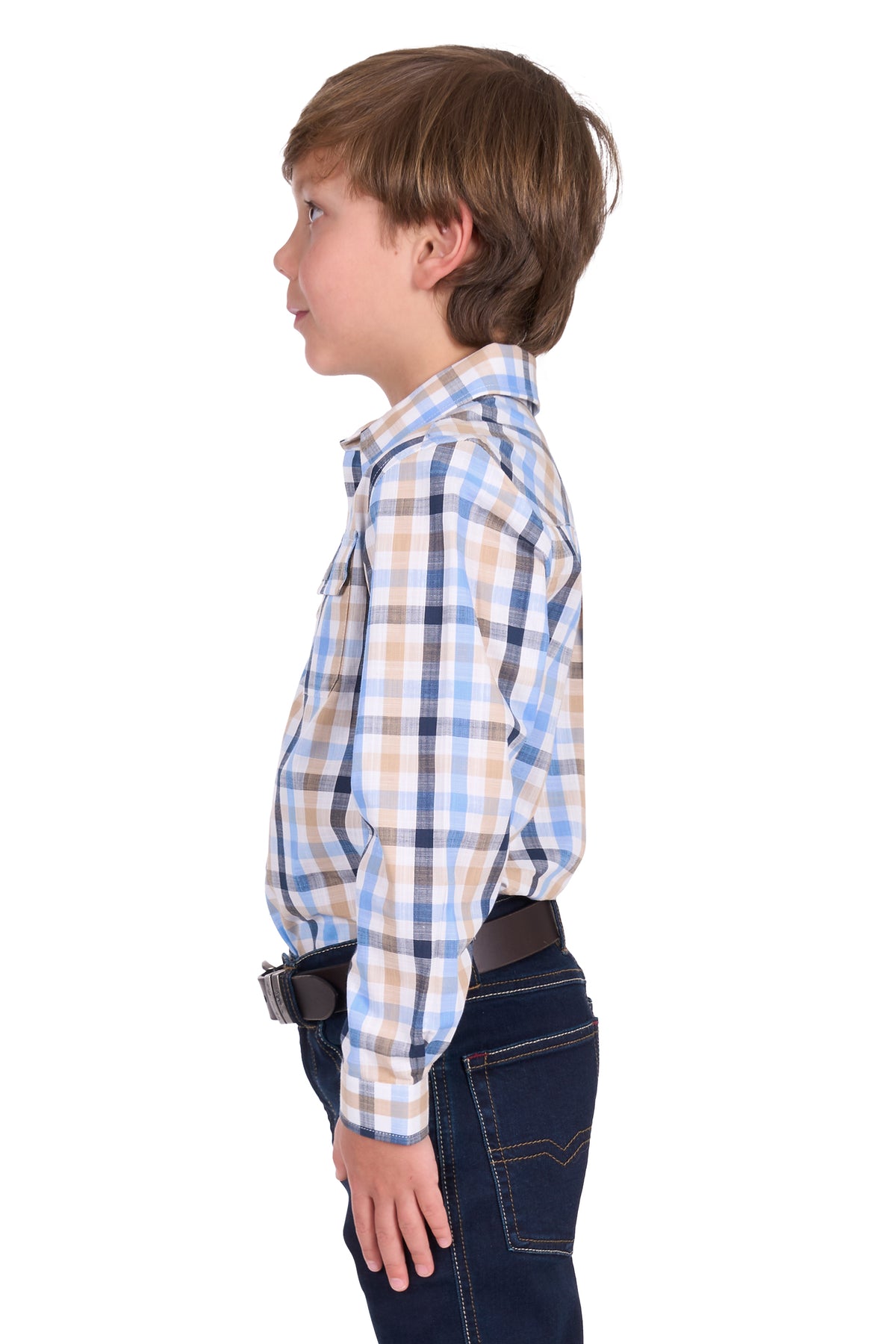 Side view of a young boy wearing a Thomas Cook Boy's Jesse L/S Western Shirt. Blue and beige checkered shirt with a belt on a white background