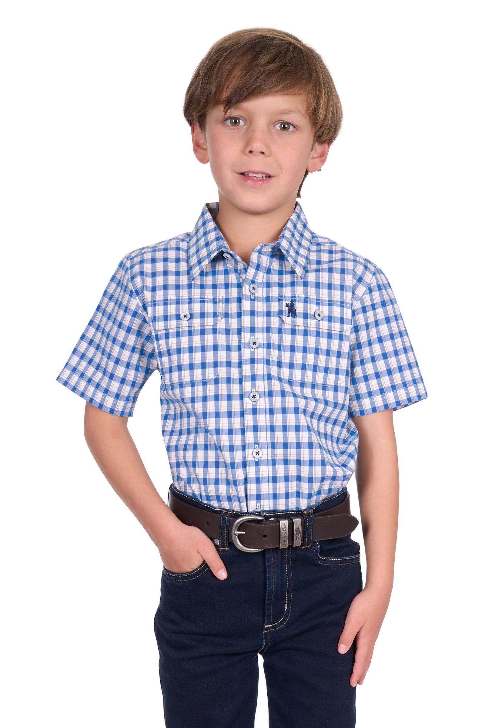 Thomas Cook Boy's Chris S/S Shirt. Young boy wearing a blue and white checkered shirt with a brown belt on a white background