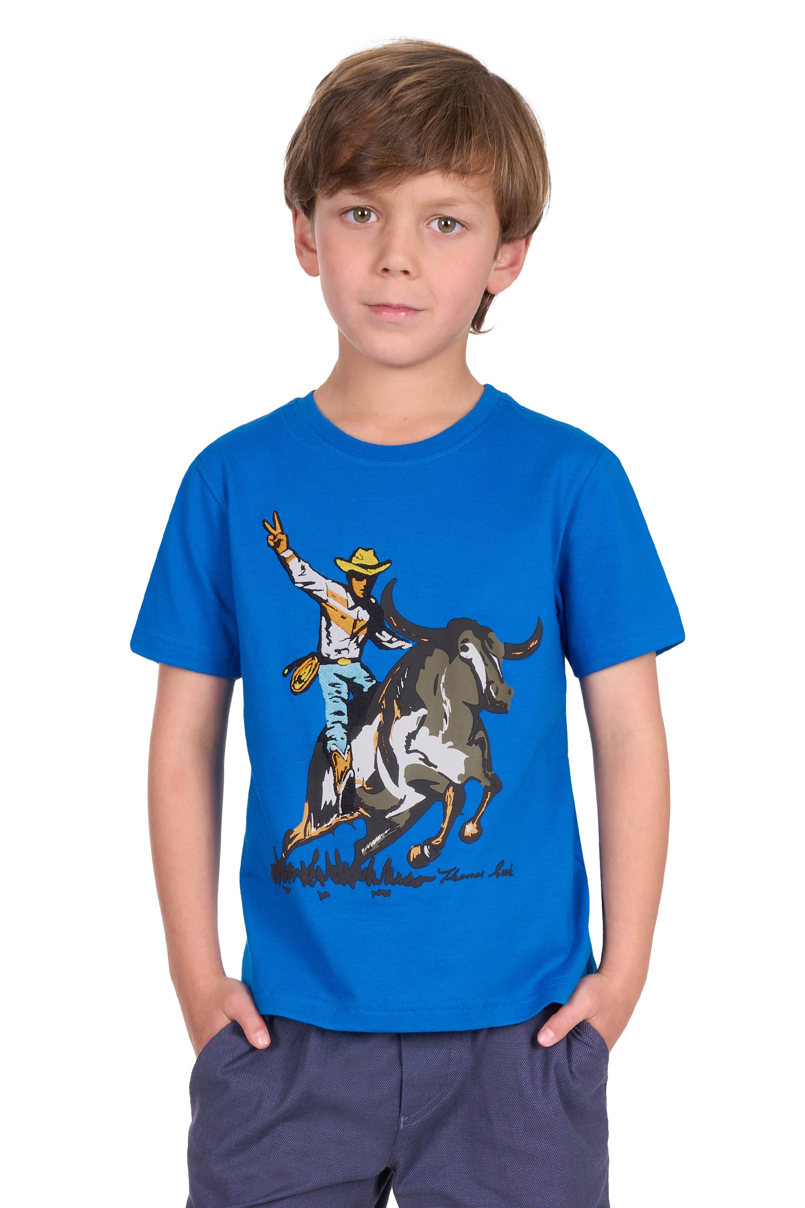Thomas Cook Boy's Robbie S/S T-Shirt. Child wearing a blue t-shirt with a graphic of a cowboy on a horse