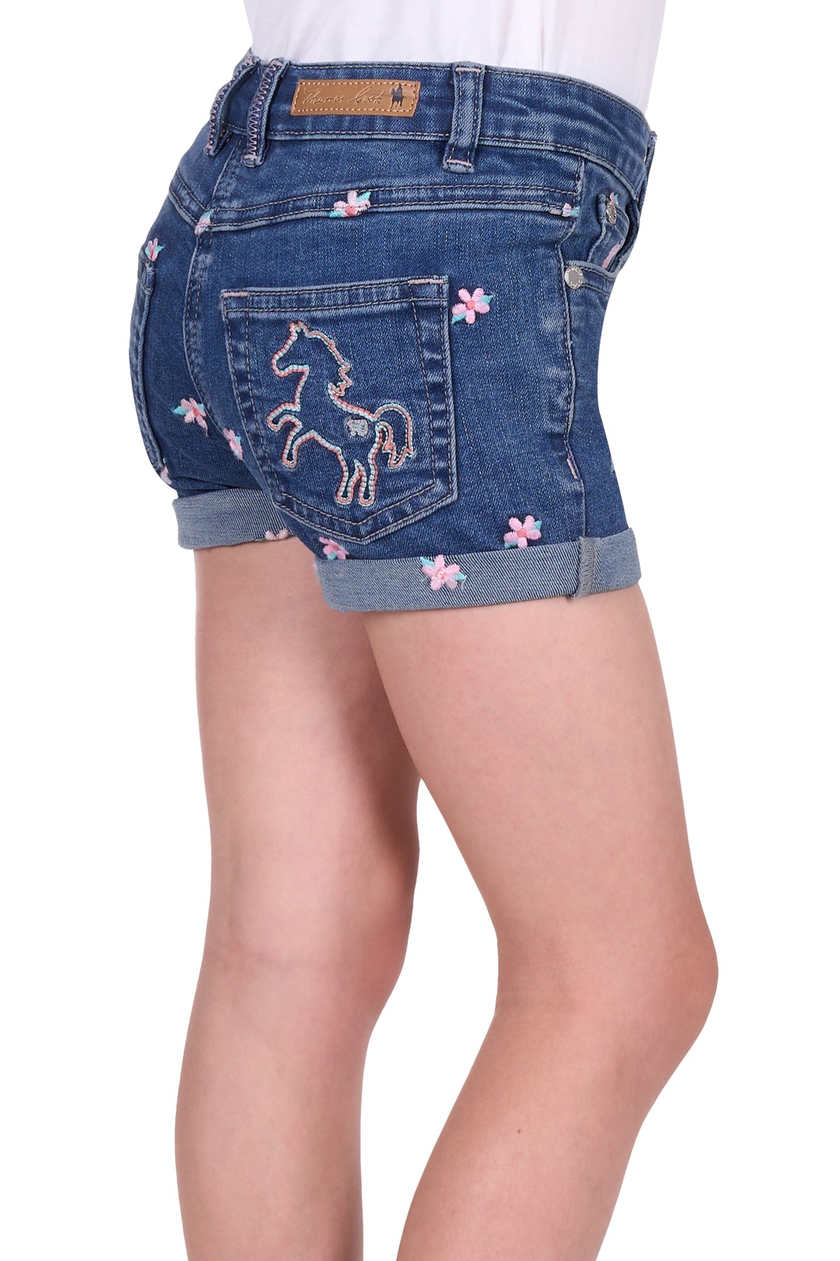 Side view if Thomas Cook Girl's Hailey Denim Short. Blue denim shorts with floral and horse embroidery on a white background