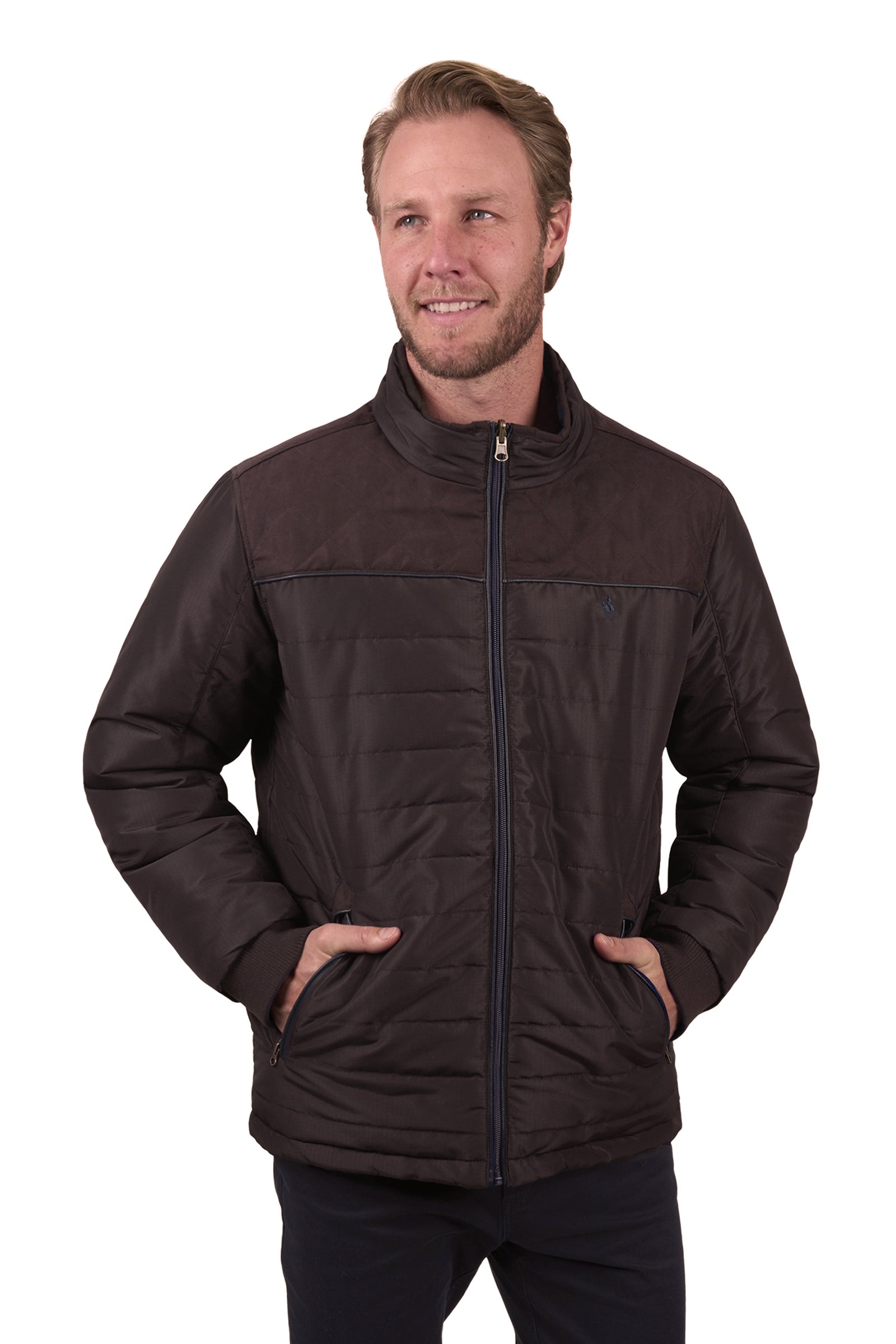 A man wearing a Thomas Cook Men's Nathan Reversible Jacket in black color, featuring a zip closure and a mock neckline.