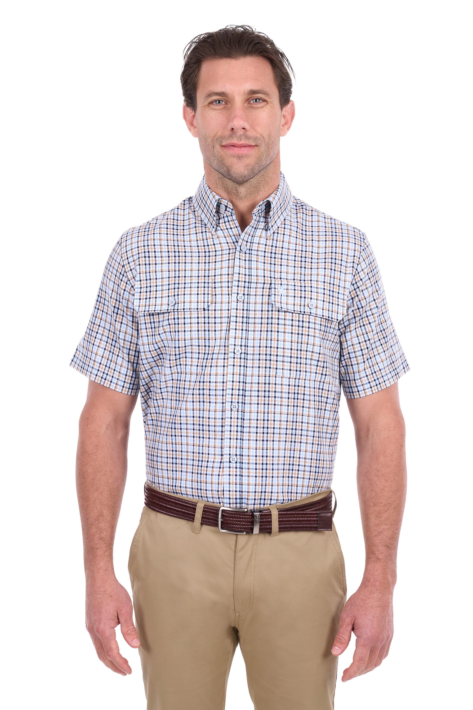 A man wearing a short-sleeve button-down shirt with a blue, red, and white checkered pattern, paired with khaki pants and a brown belt, standing against a white background.