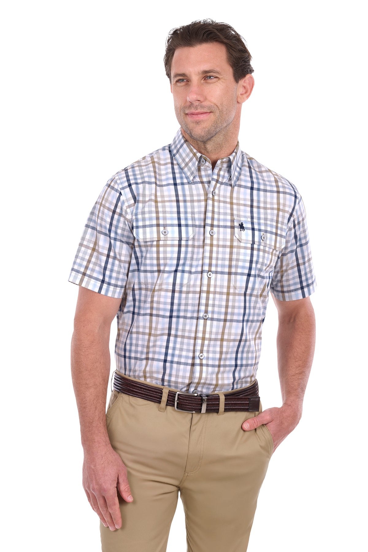 A man wearing a short-sleeve button-down plaid shirt in blue, white, and tan, paired with khaki pants and a dark brown belt, photographed against a solid white background.