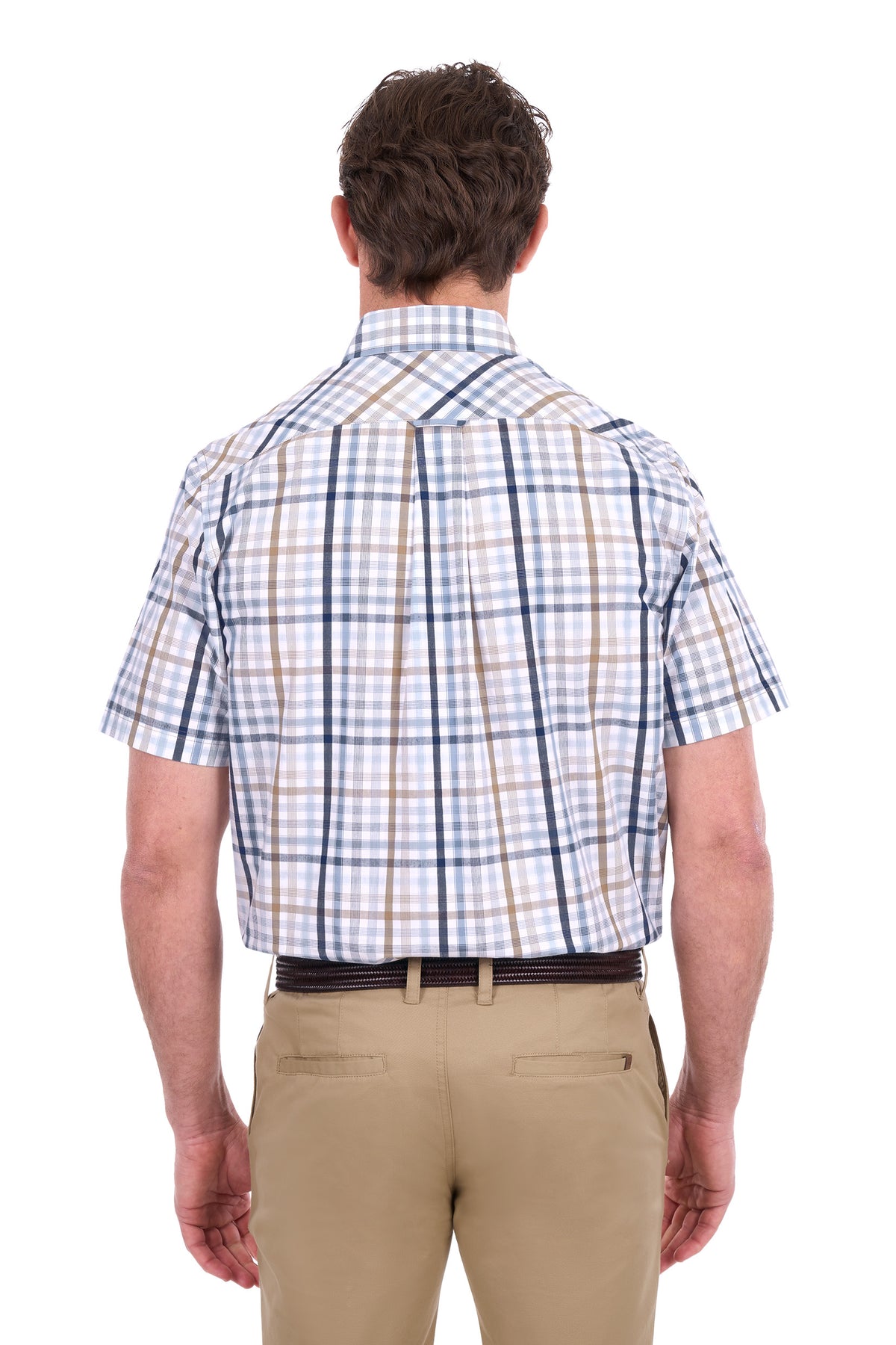 A man viewed from the back wearing a short-sleeve plaid button-down shirt in white, blue, and tan, paired with khaki pants and a dark belt, against a plain white background.