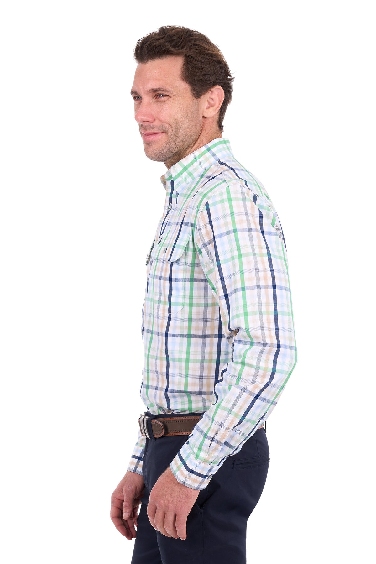 A man shown in profile wearing a long-sleeve plaid button-down shirt with green, blue, and white stripes on a white background.