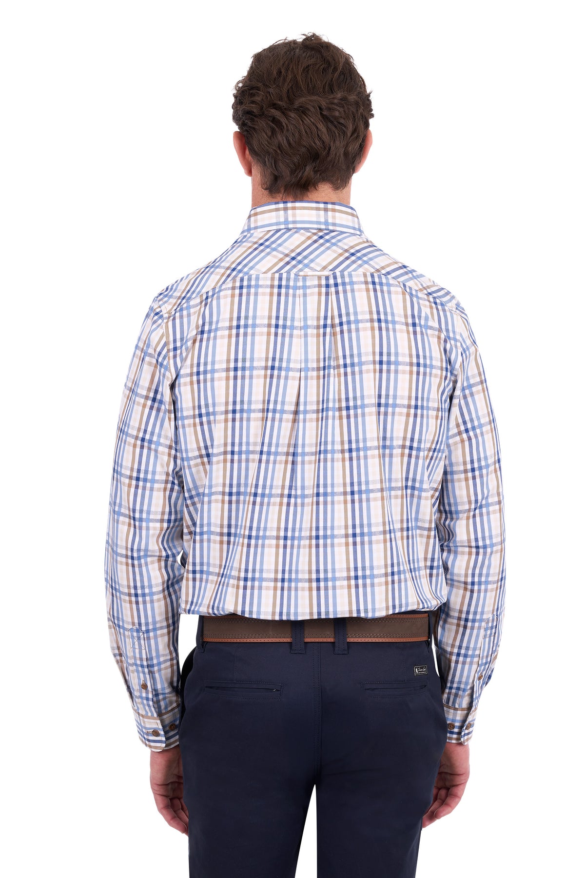 A man viewed from the back wearing a long-sleeve plaid button-down shirt with blue, white, and beige stripes, paired with dark navy trousers and a brown belt, against a plain white background.