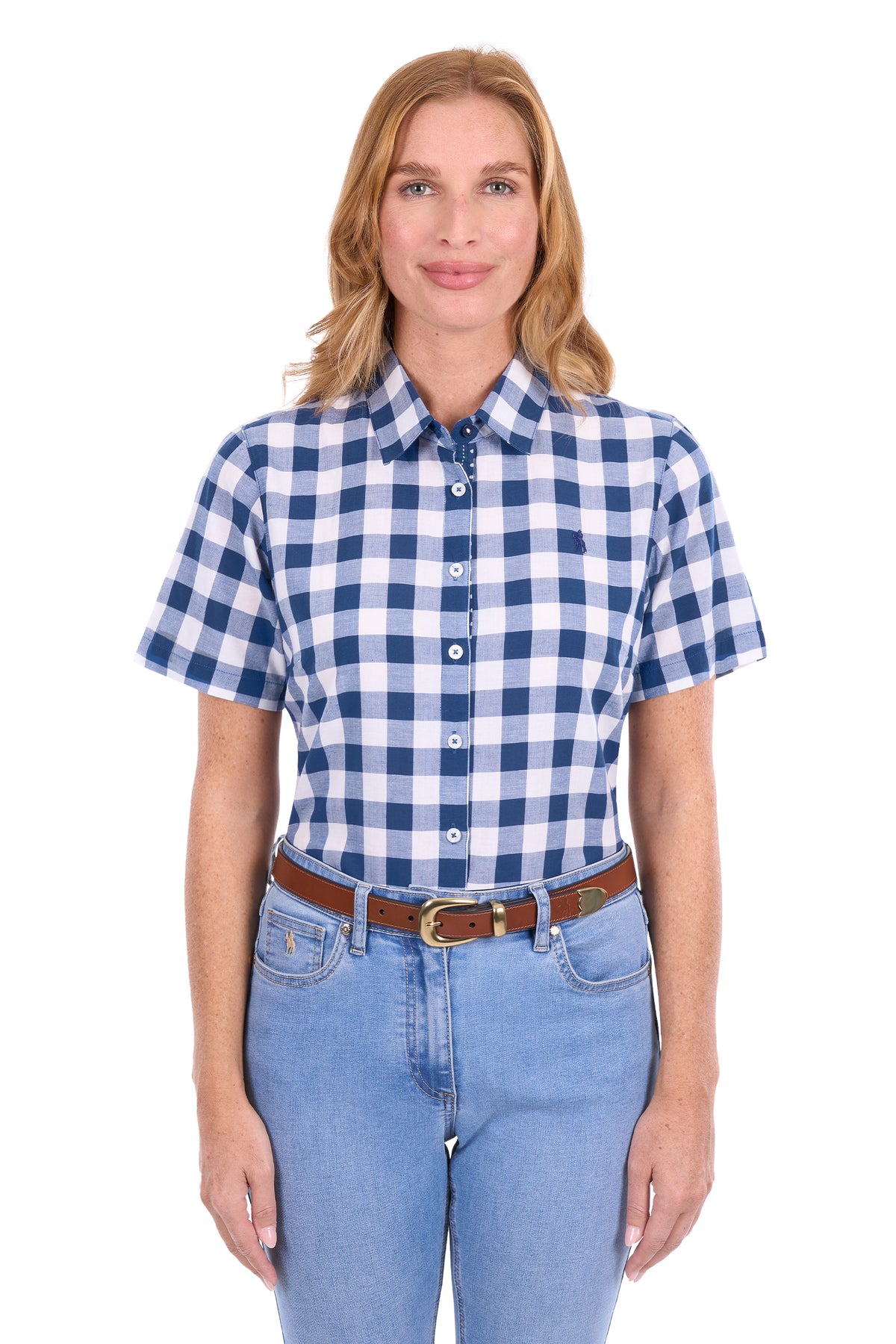 A woman modeling a short-sleeve button-down shirt with a blue and white gingham check pattern, paired with light blue jeans and a brown belt, against a plain white background.