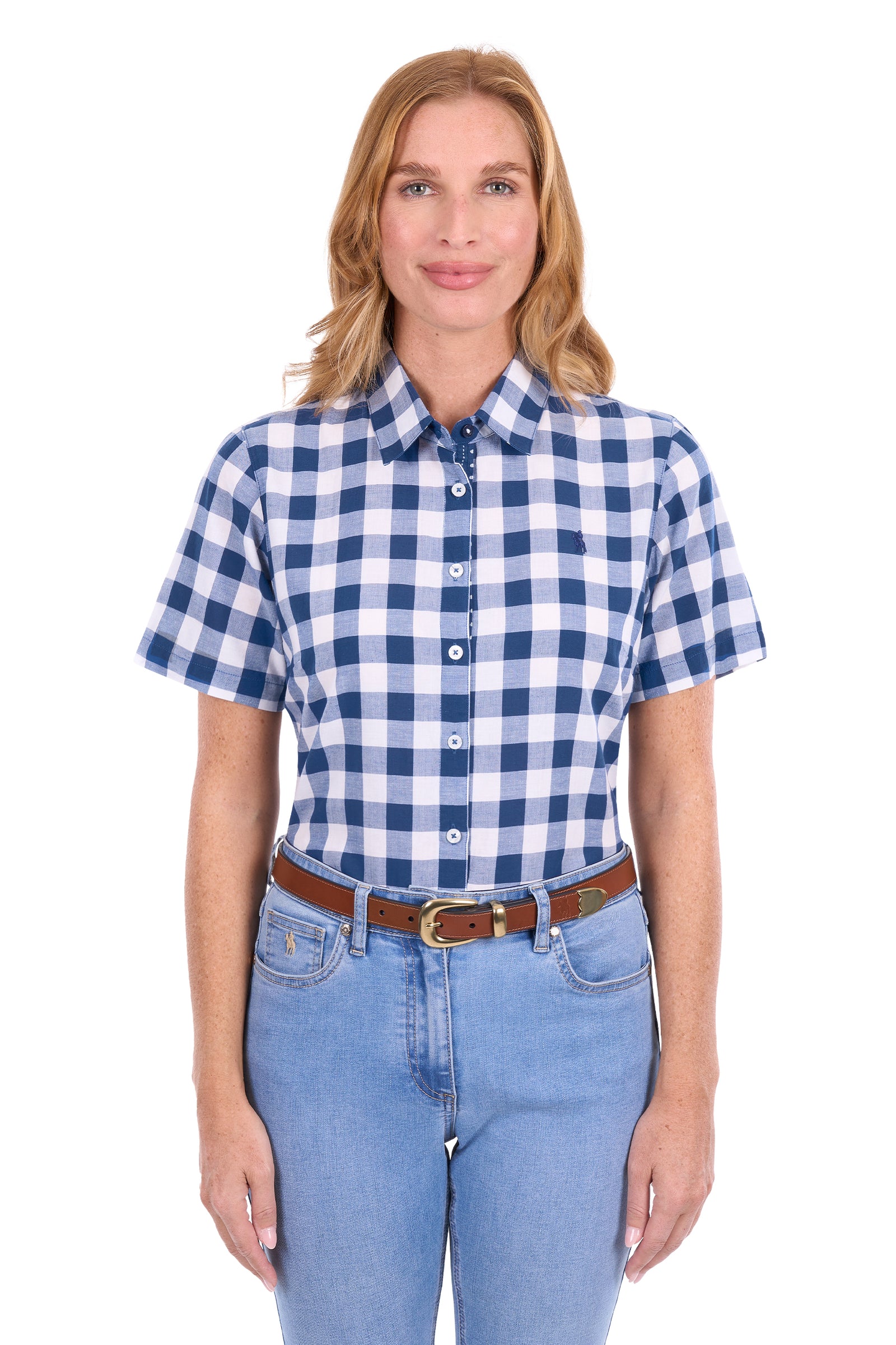 A woman modeling a short-sleeve button-down shirt with a blue and white gingham check pattern, paired with light blue jeans and a brown belt, against a plain white background.