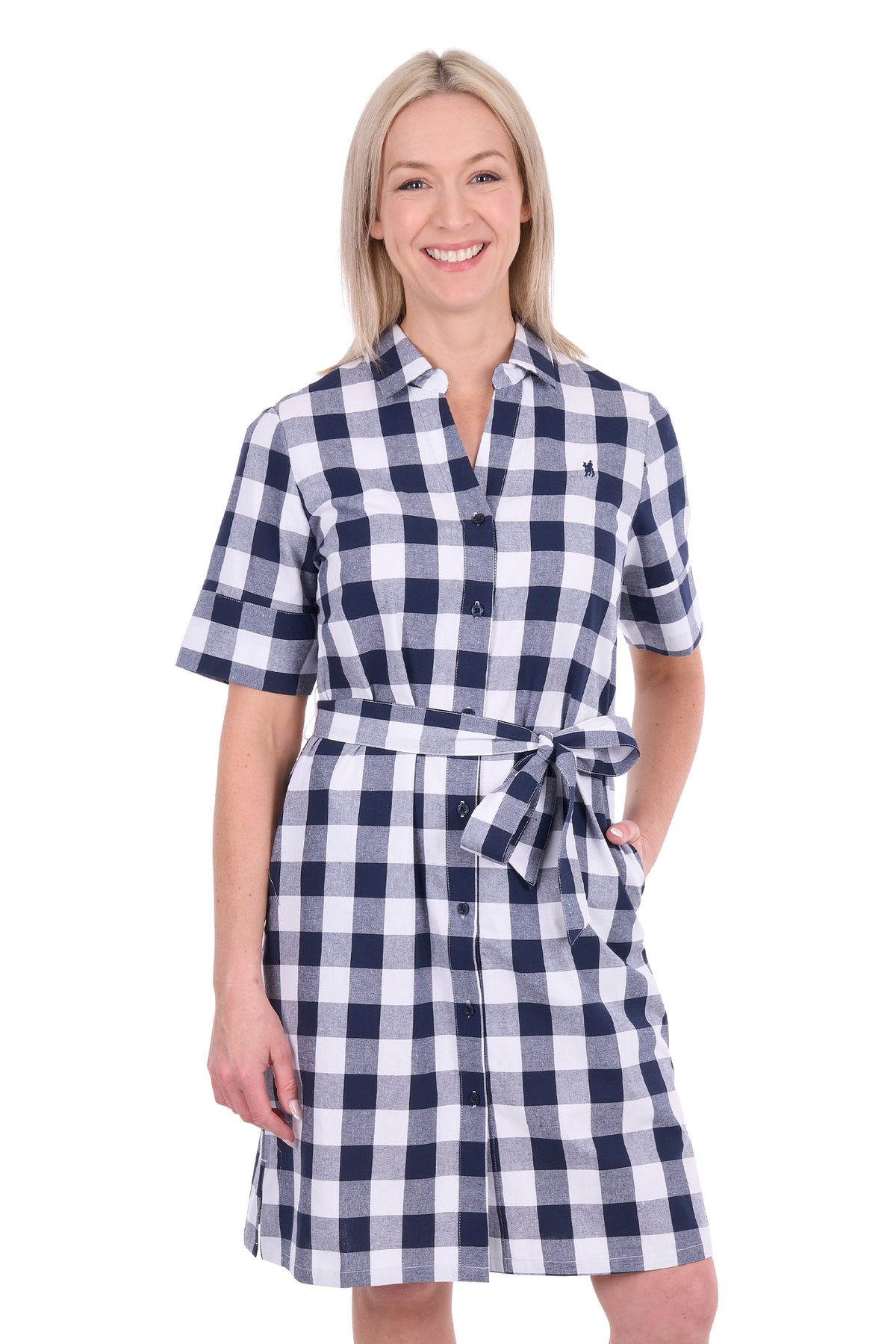 Woman wearing a blue and white checkered dress on a white background