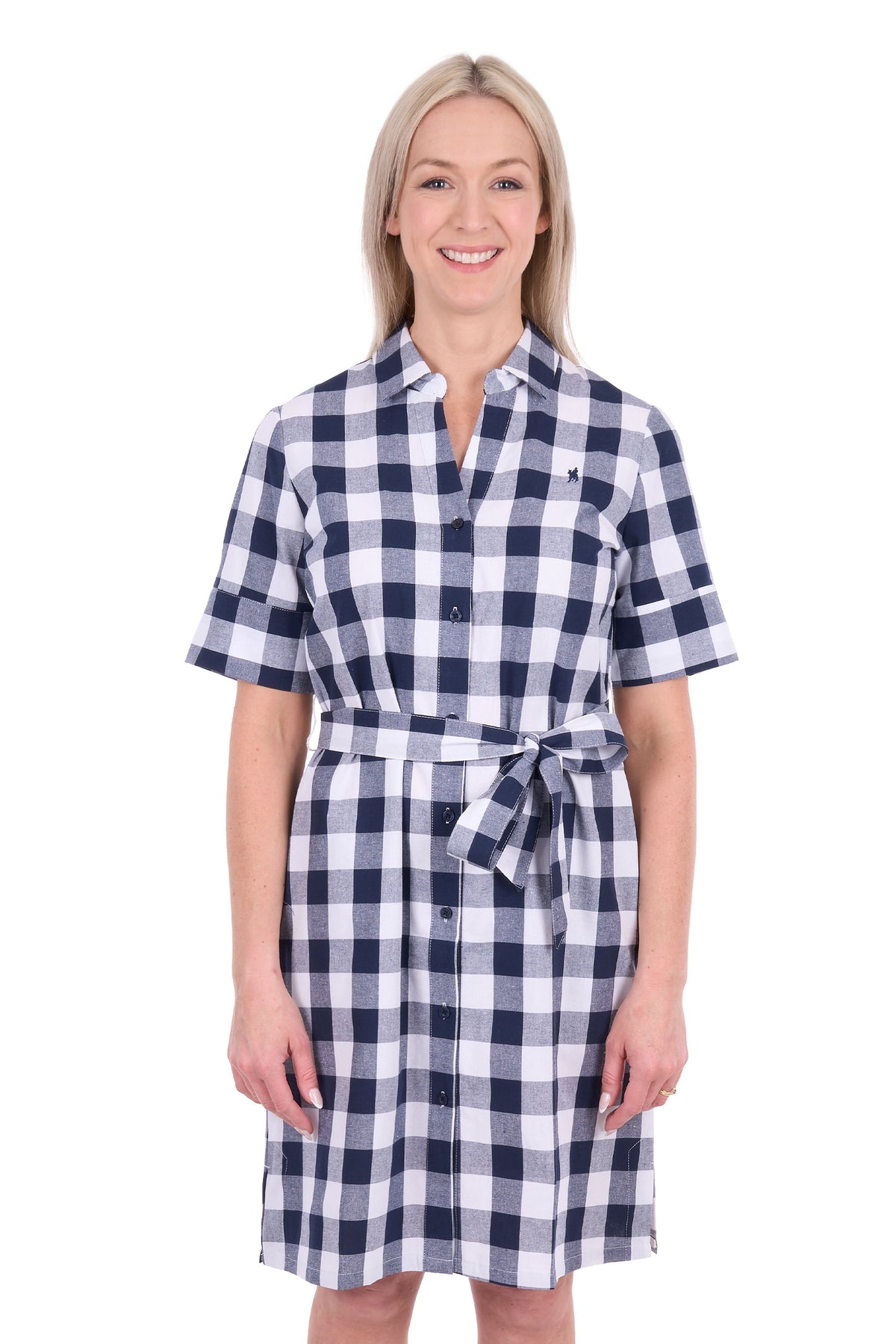 A woman modeling a short-sleeve button-front shirt dress with a navy and white gingham check pattern and a matching tie belt, photographed against a plain white background.