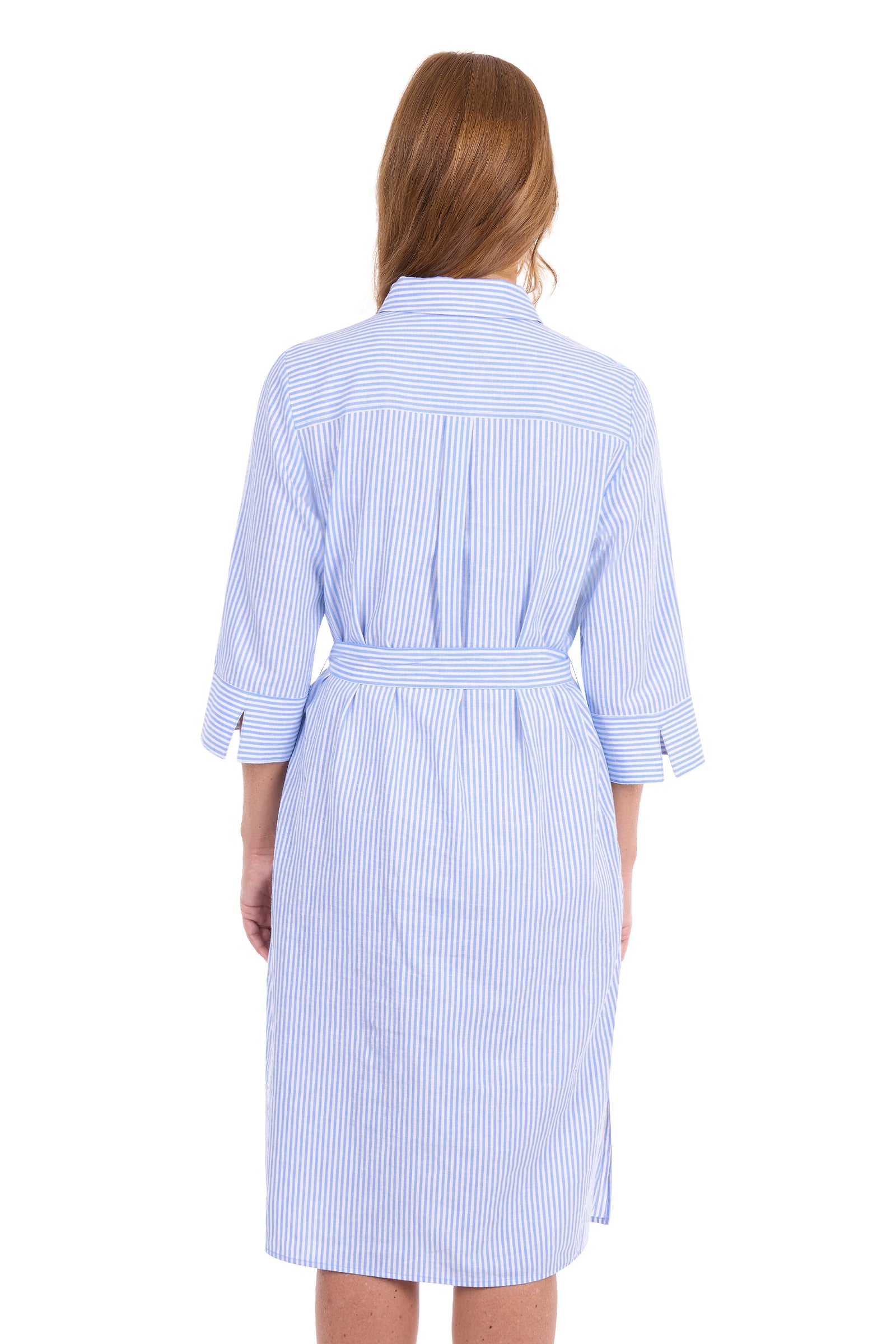 A woman viewed from the back wearing a light blue and white vertically striped shirt dress with three-quarter sleeves and a matching tie belt, set against a plain white background.