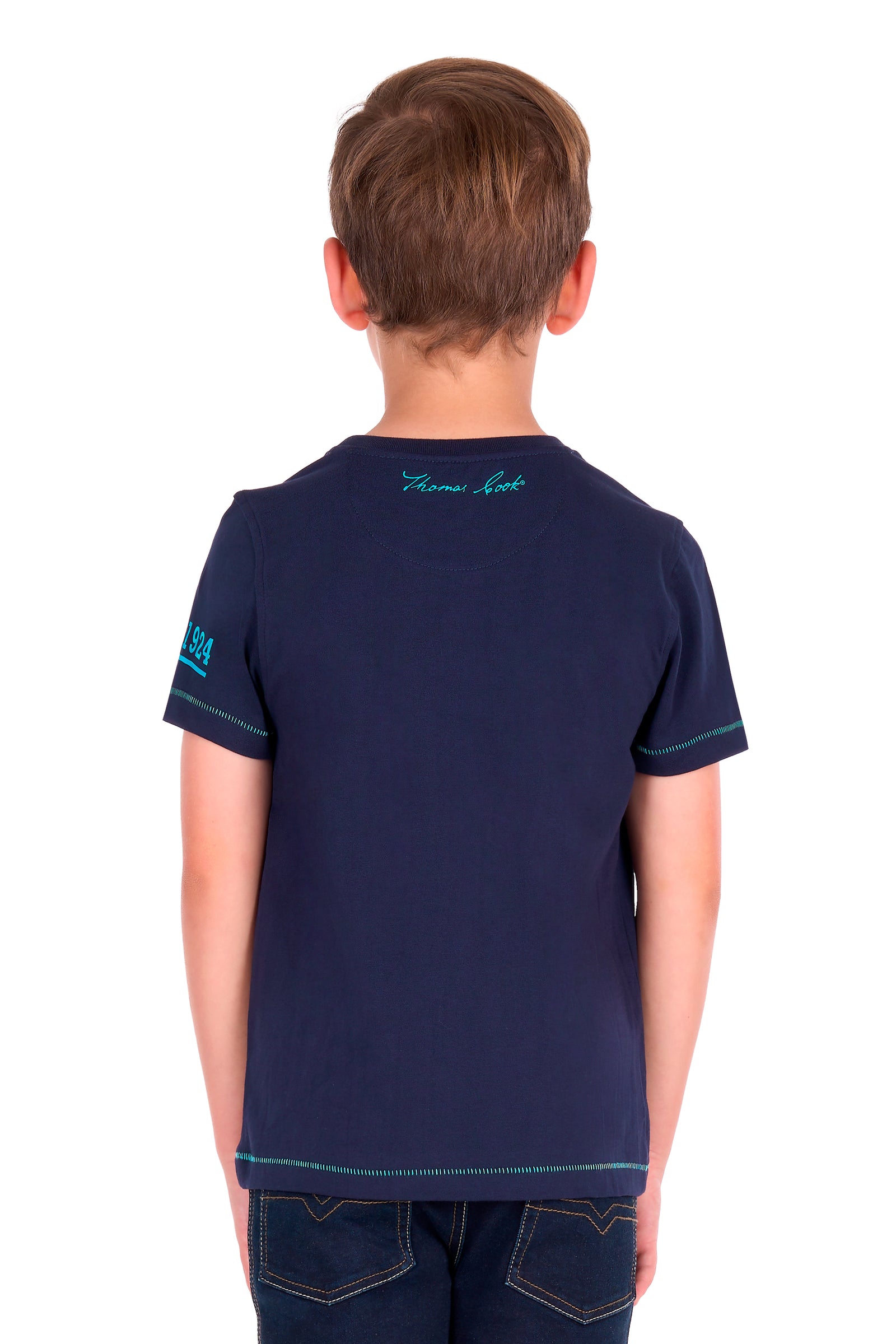A child viewed from the back wearing a navy blue short-sleeve t-shirt with teal embroidered details on the neck and sleeve, paired with dark jeans, against a plain white background.