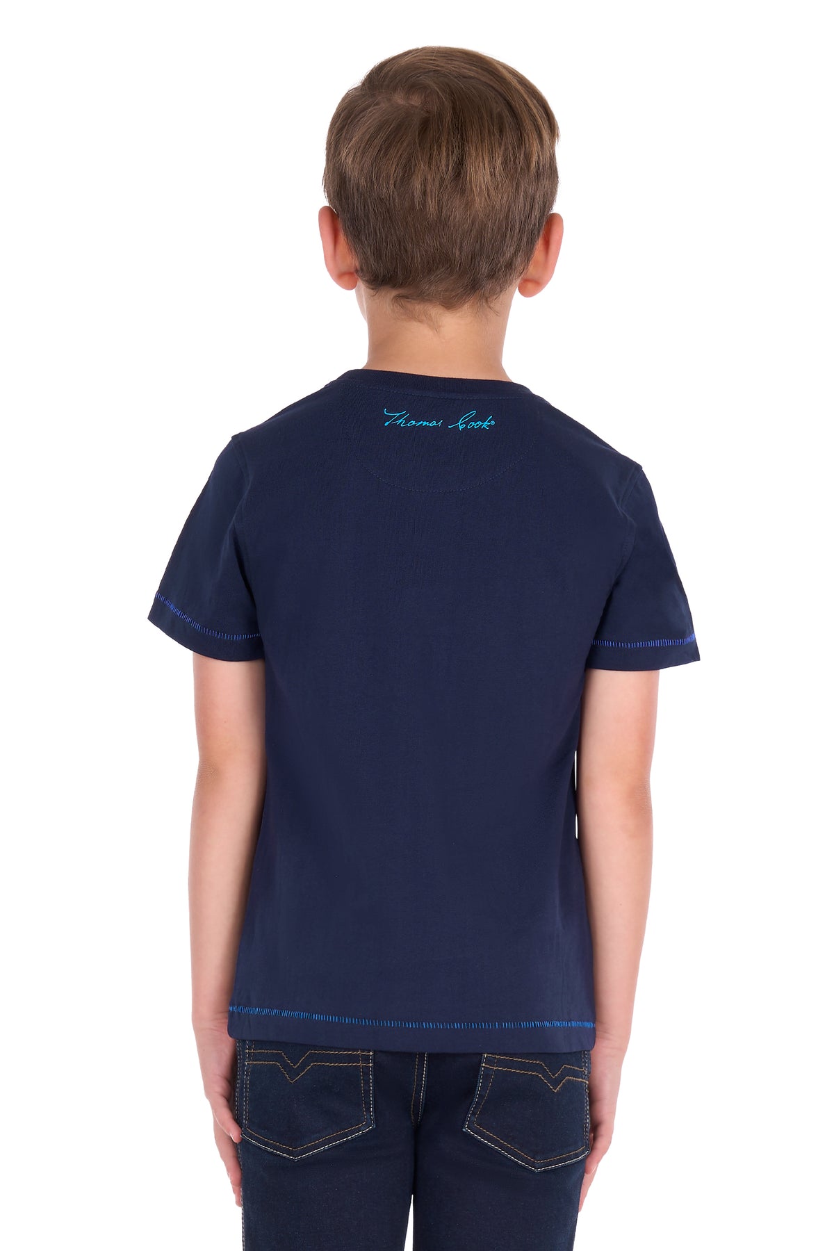 A child viewed from the back wearing a navy blue short-sleeve t-shirt with a small light blue script logo on the upper back, paired with dark jeans, against a plain white background.