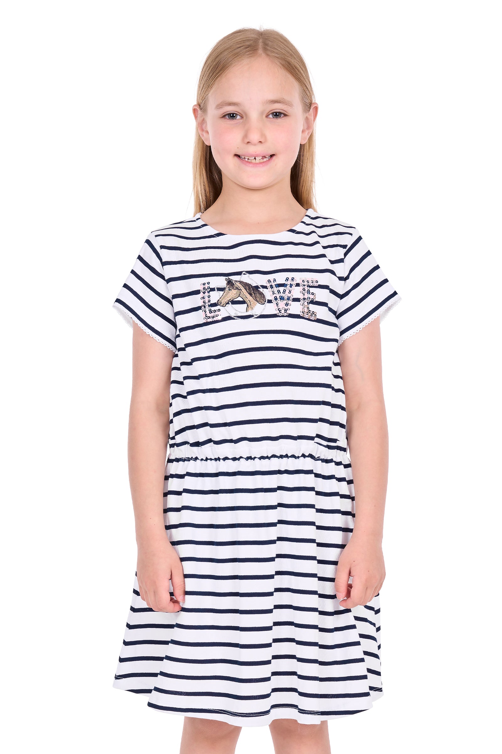 A young girl with blonde hair stands against a white background wearing a short-sleeve navy and white striped dress with a 'LOVE' graphic across the chest.