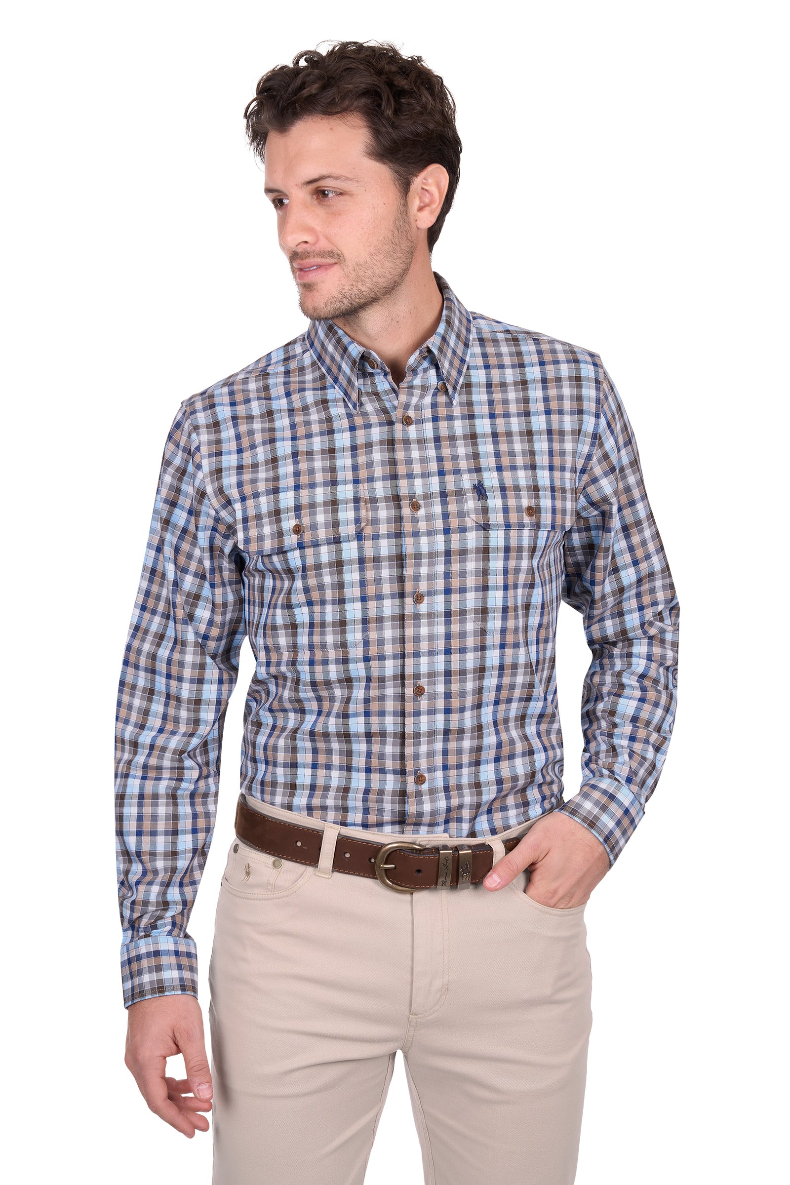 Man wearing a blue and brown checkered shirt with beige pants on a white background
