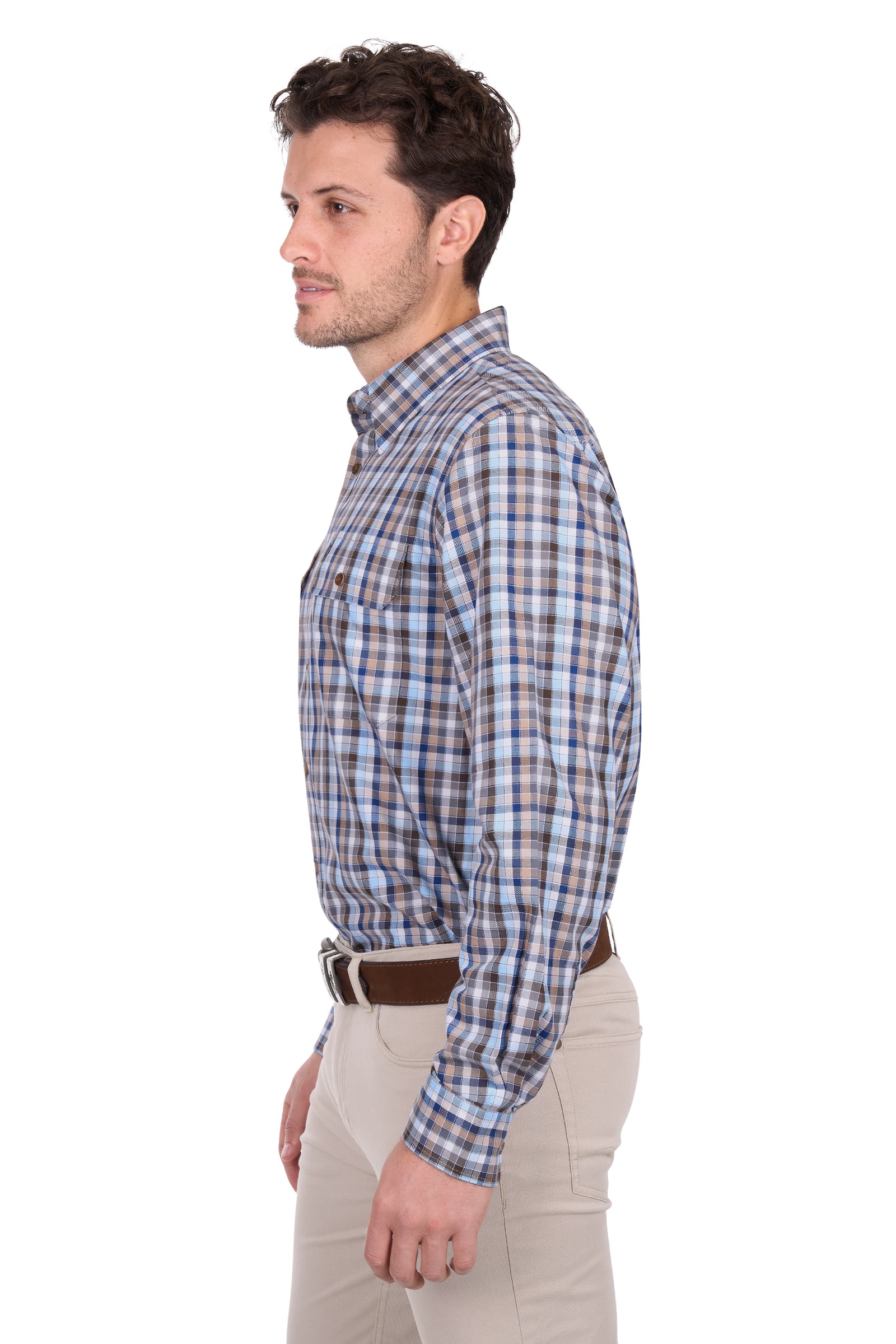 Man wearing a blue plaid shirt and beige pants on a white background