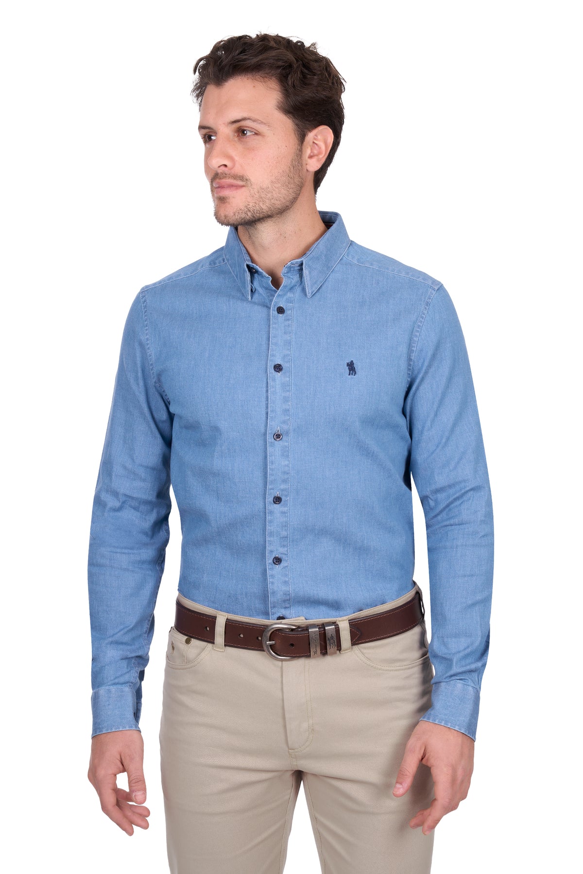 Man wearing a blue checkered shirt and beige pants with a brown belt.